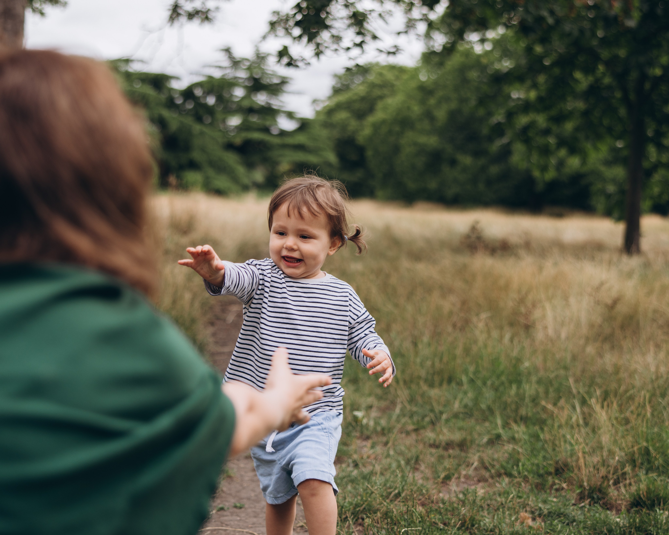 Milena with parents (Greenwich Park). Anastasia Klink, Photographer in London