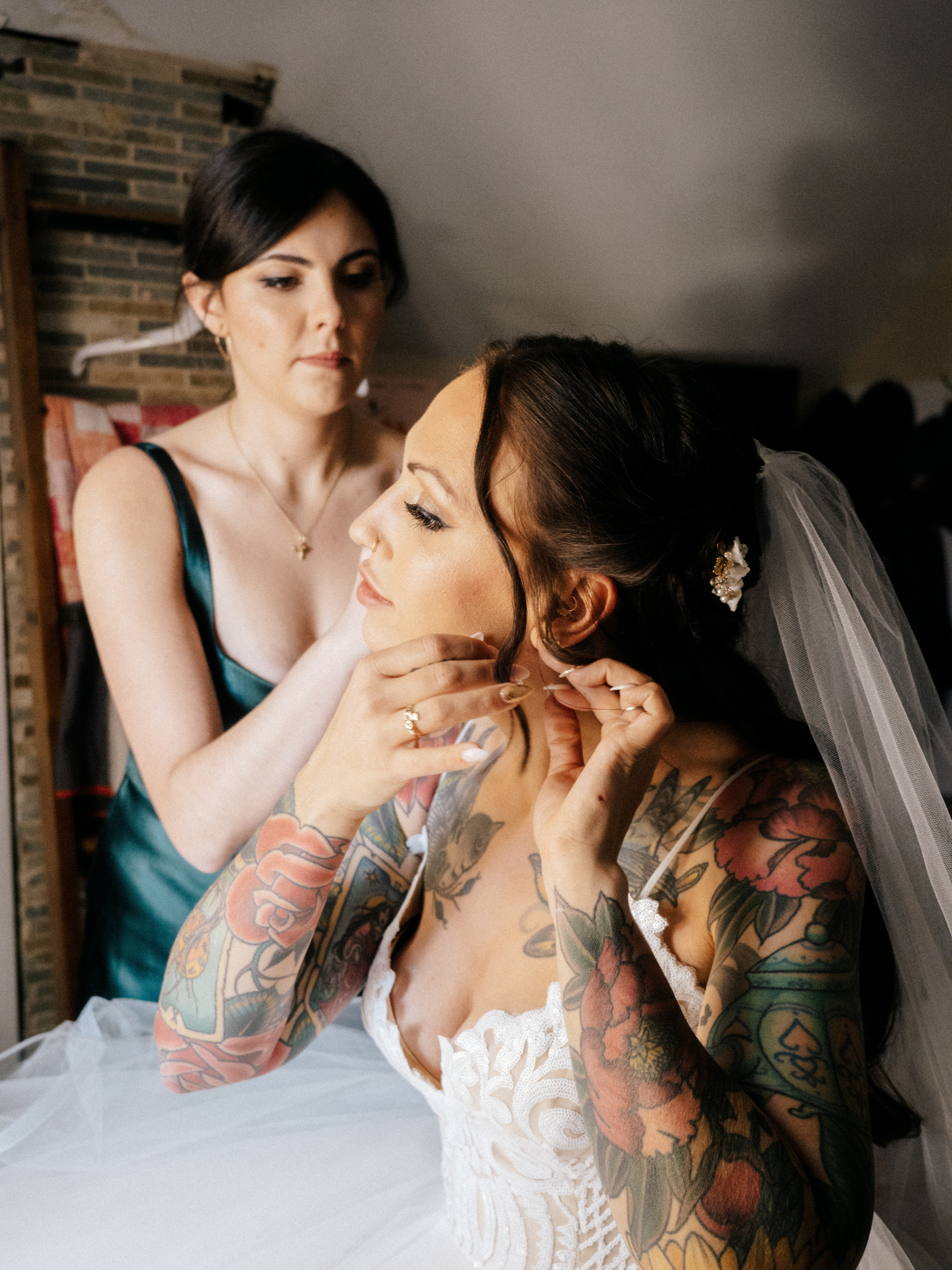 Bride and bridesmaid getting ready in Lachine, Quebec. 