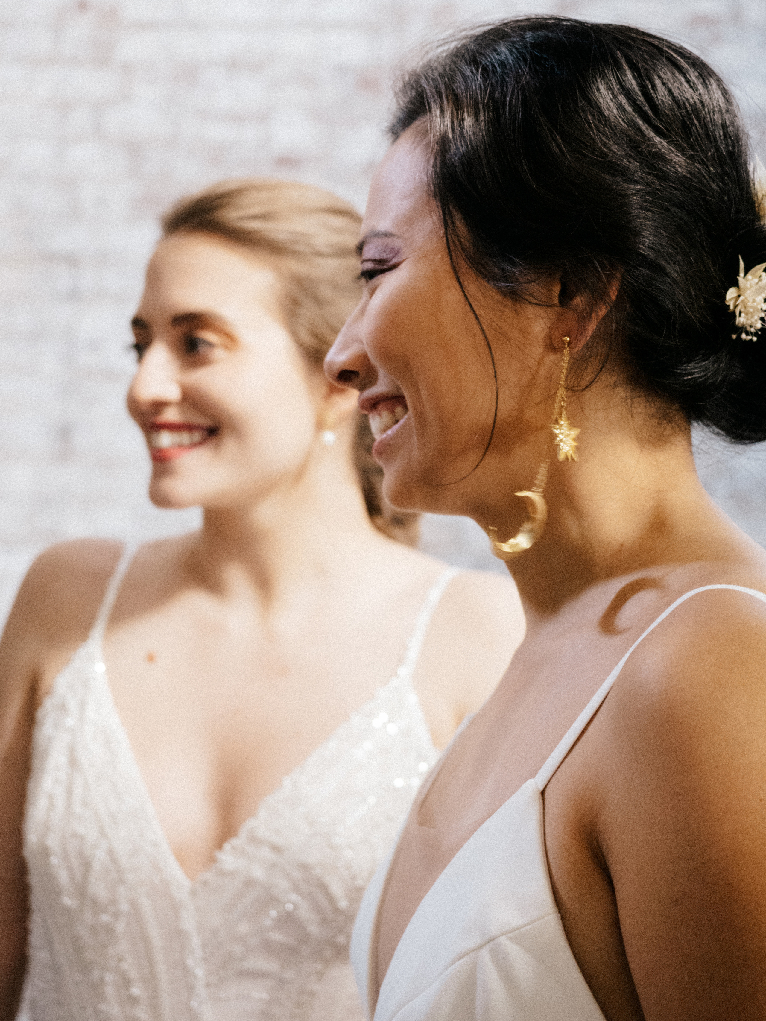 Close up portrait of two beautiful brides in Montreal, Canada.
