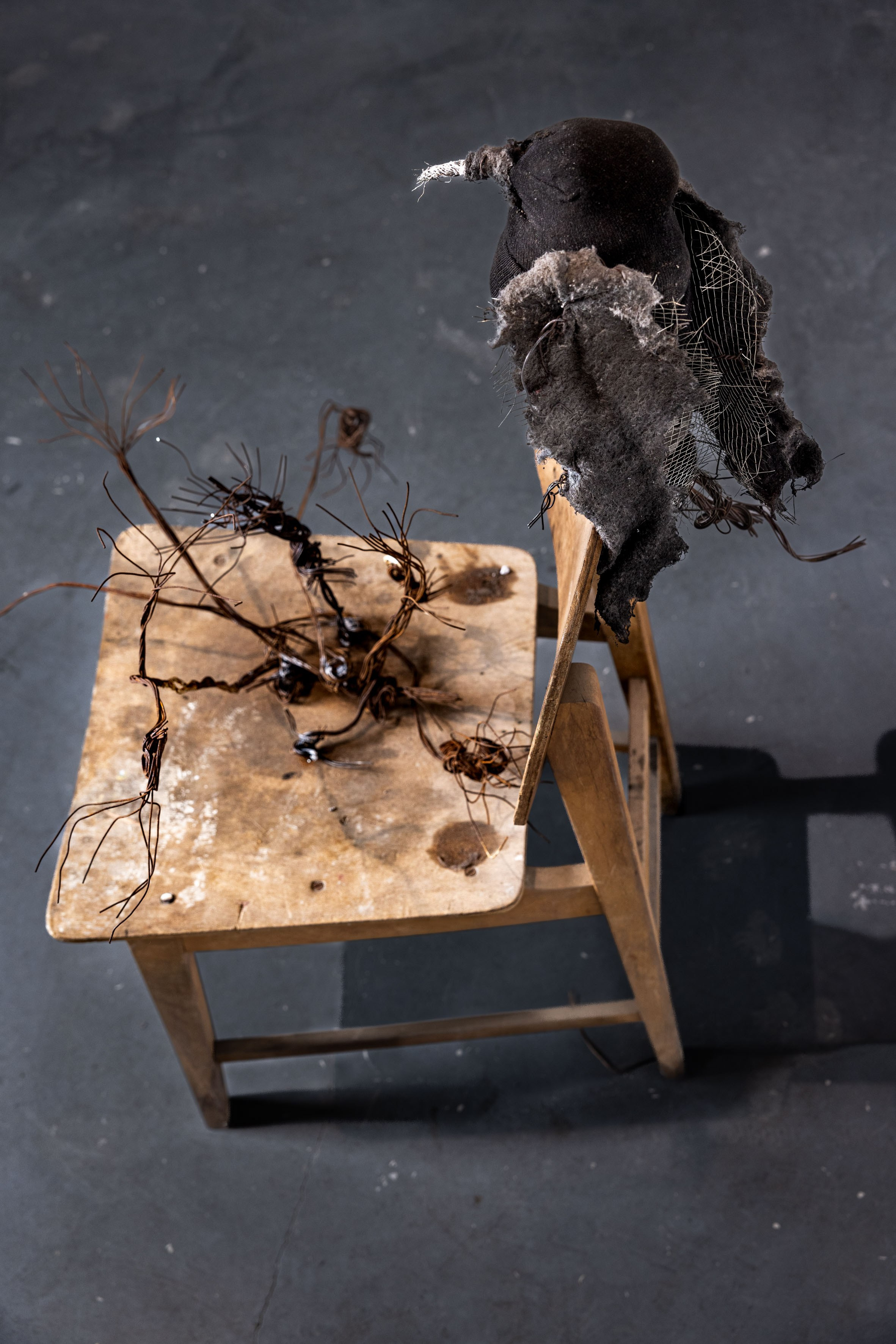 Bird and rusted flowers on chair, 2024. Haim Sokol’s artists website