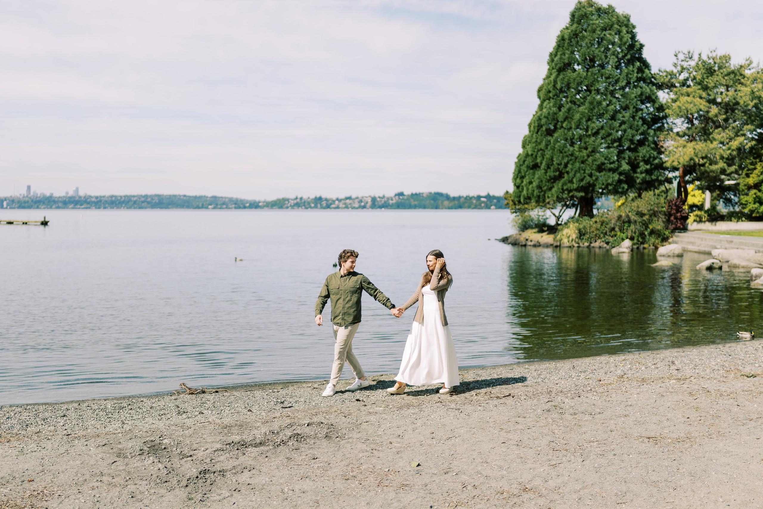 Engagement photo shoot Jake & Caroline / May 2024. Marina Park|Kirkland, WA. EVAN ARISTOV WEDDING PHOTOGRAPHY — Seattle Wedding Photographer