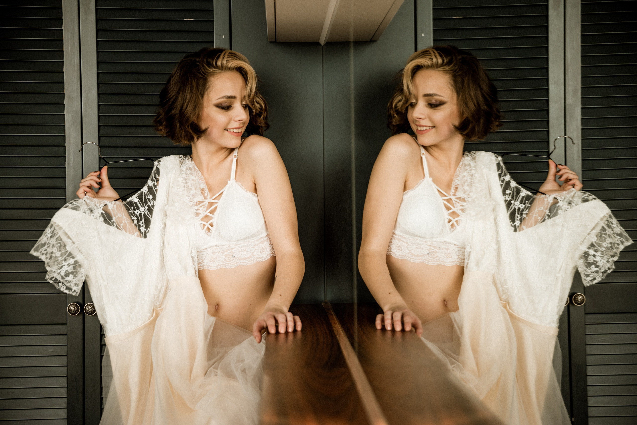 Romantic seaside bridal portraits with blue sea background, wedding photographer Spain