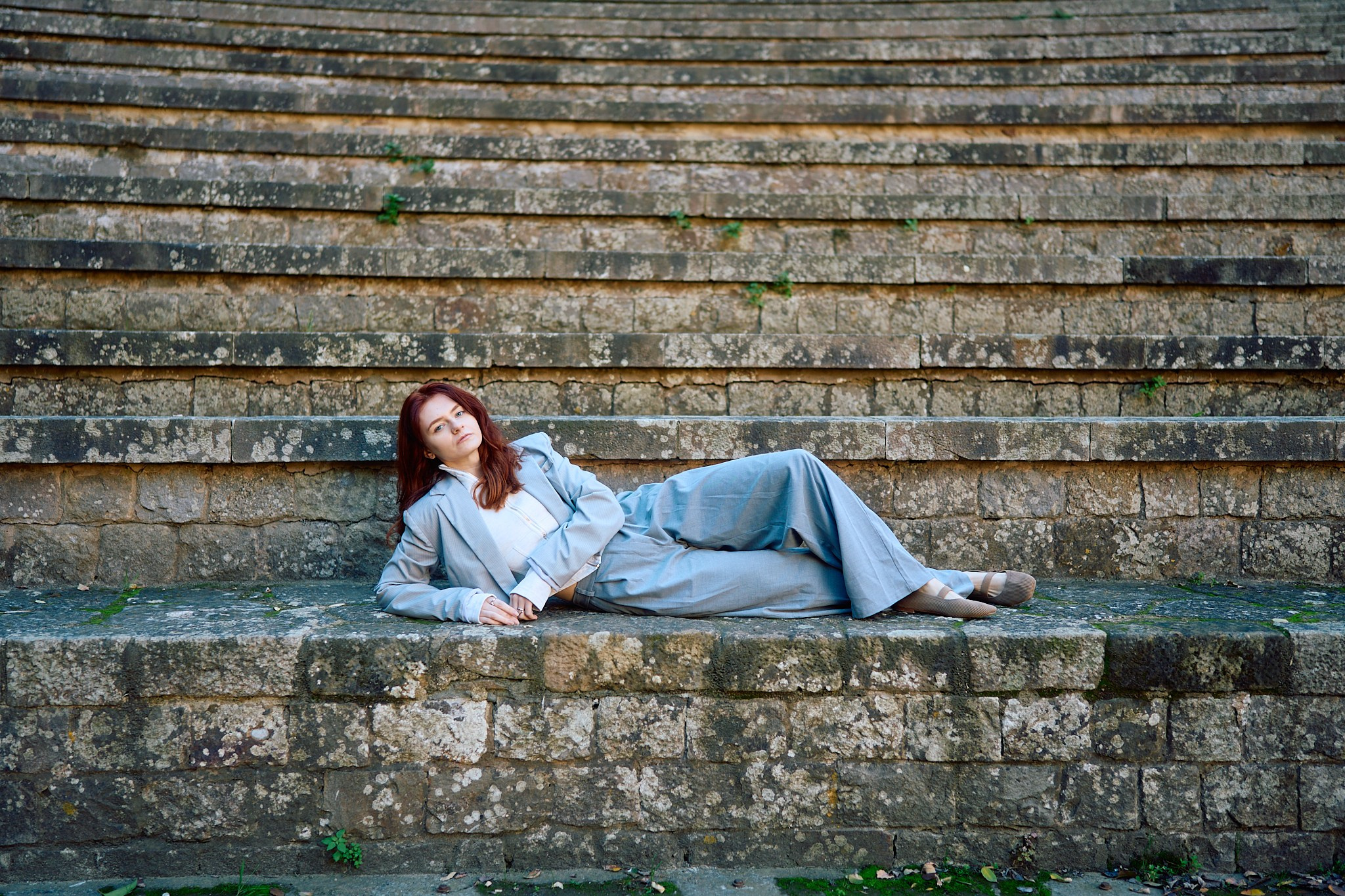 Description of the Theatre Grec location for a  love-story or individual photo shoot in Barcelona, examples of photos taken at this spot. POSTCARD.BCN Photographer Kate in Barcelona. Love-story, family or individual photo shoots