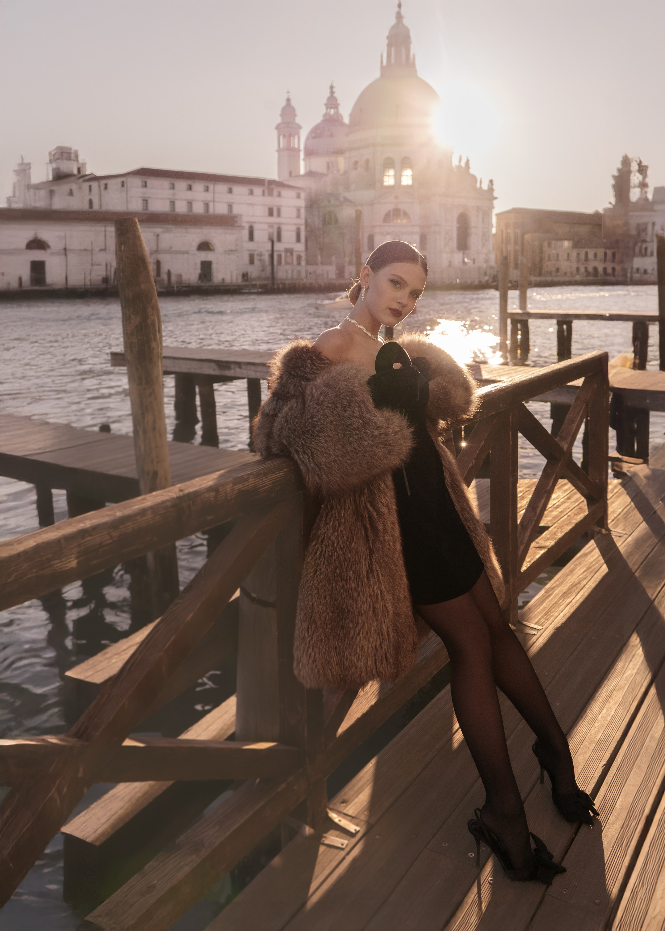 Fashion shoot in Venice with elegant Italian styling and gondolas in the background.