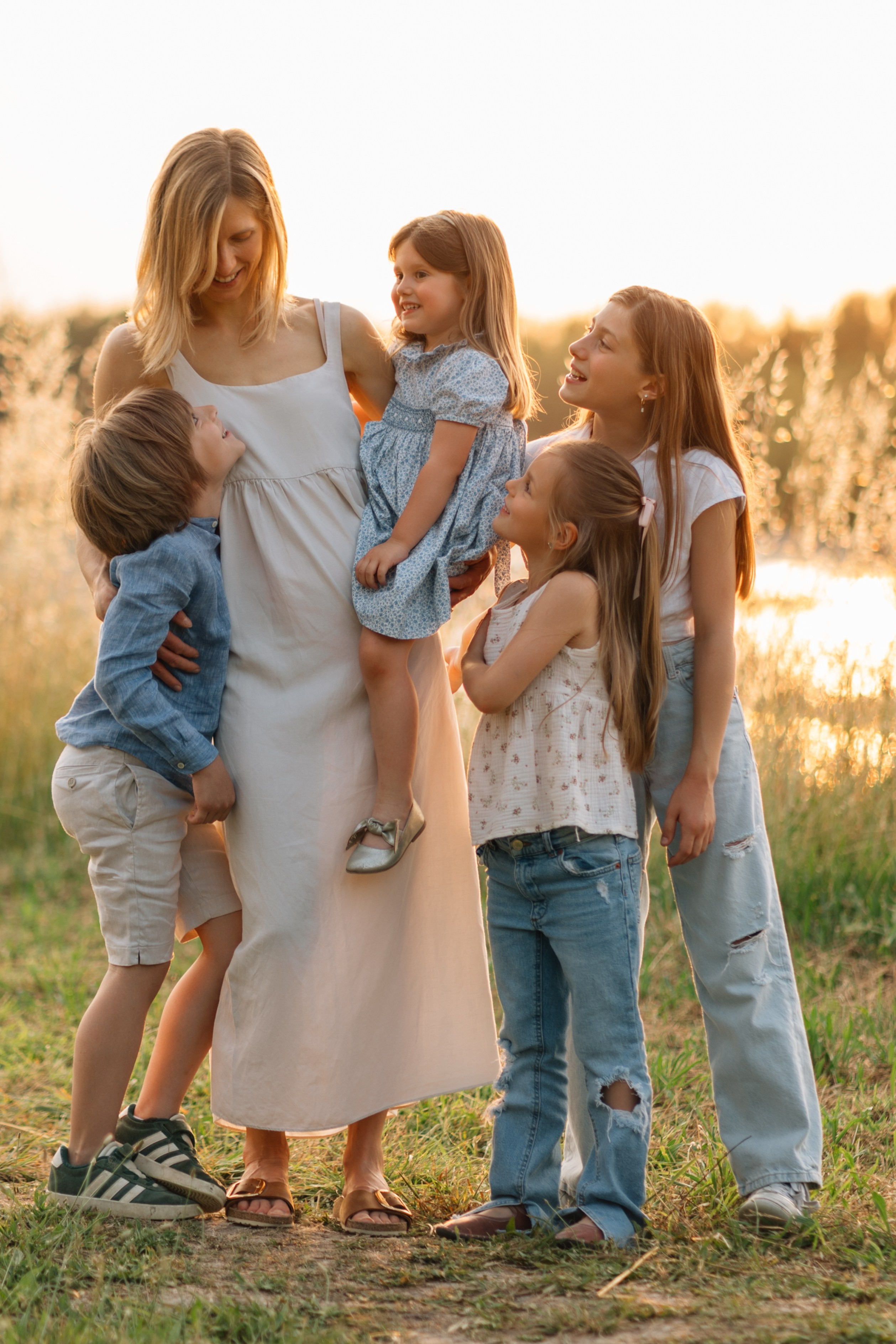 Servizio fotografico di famiglia in un parco a Rimini, Italia. Fotografa di matrimoni e di famiglia in Italia