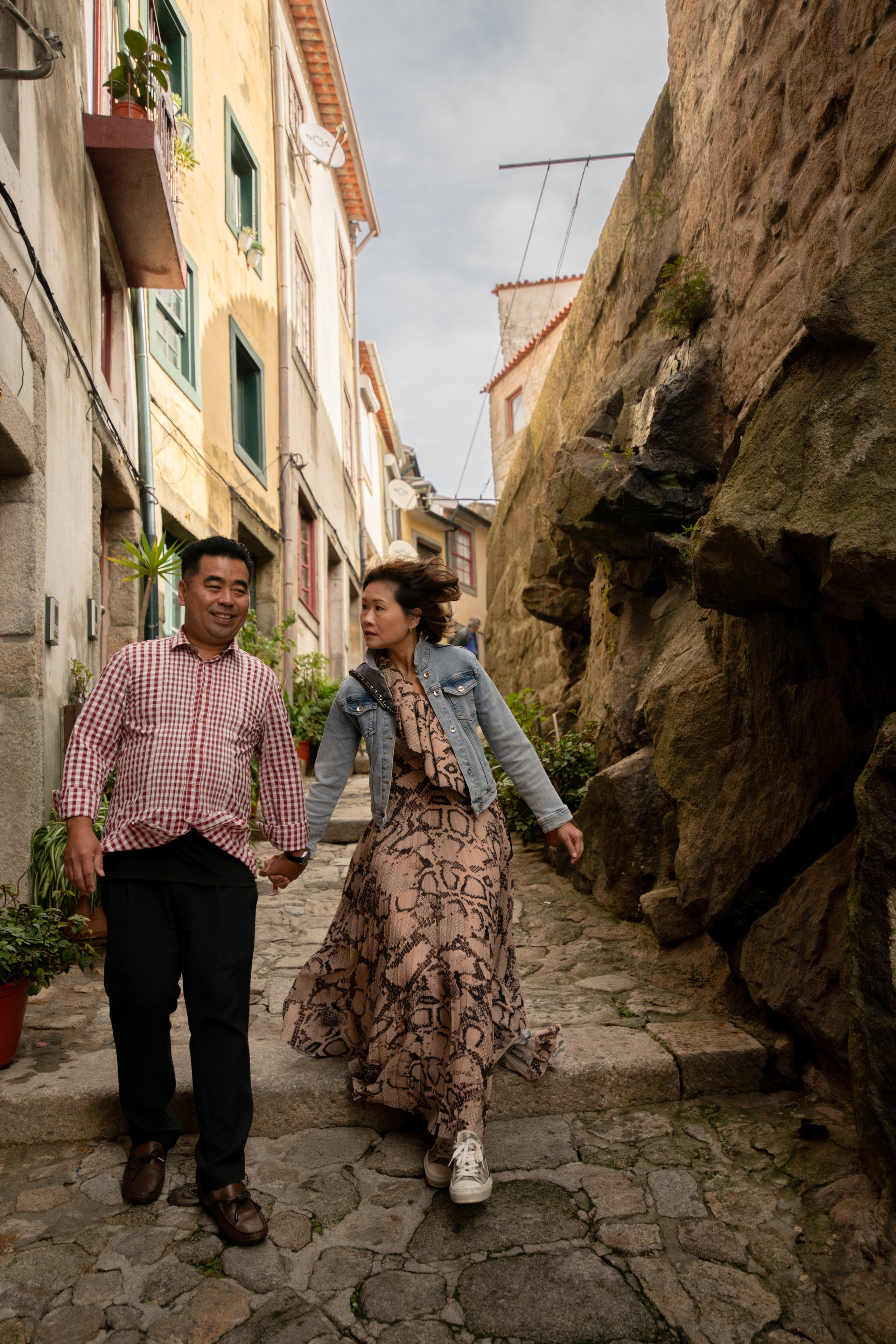 YOKE and ALFRED. Walking in Porto after the rain. Anastasiia Antoniuk portrait, family and couple photographer, Portugal