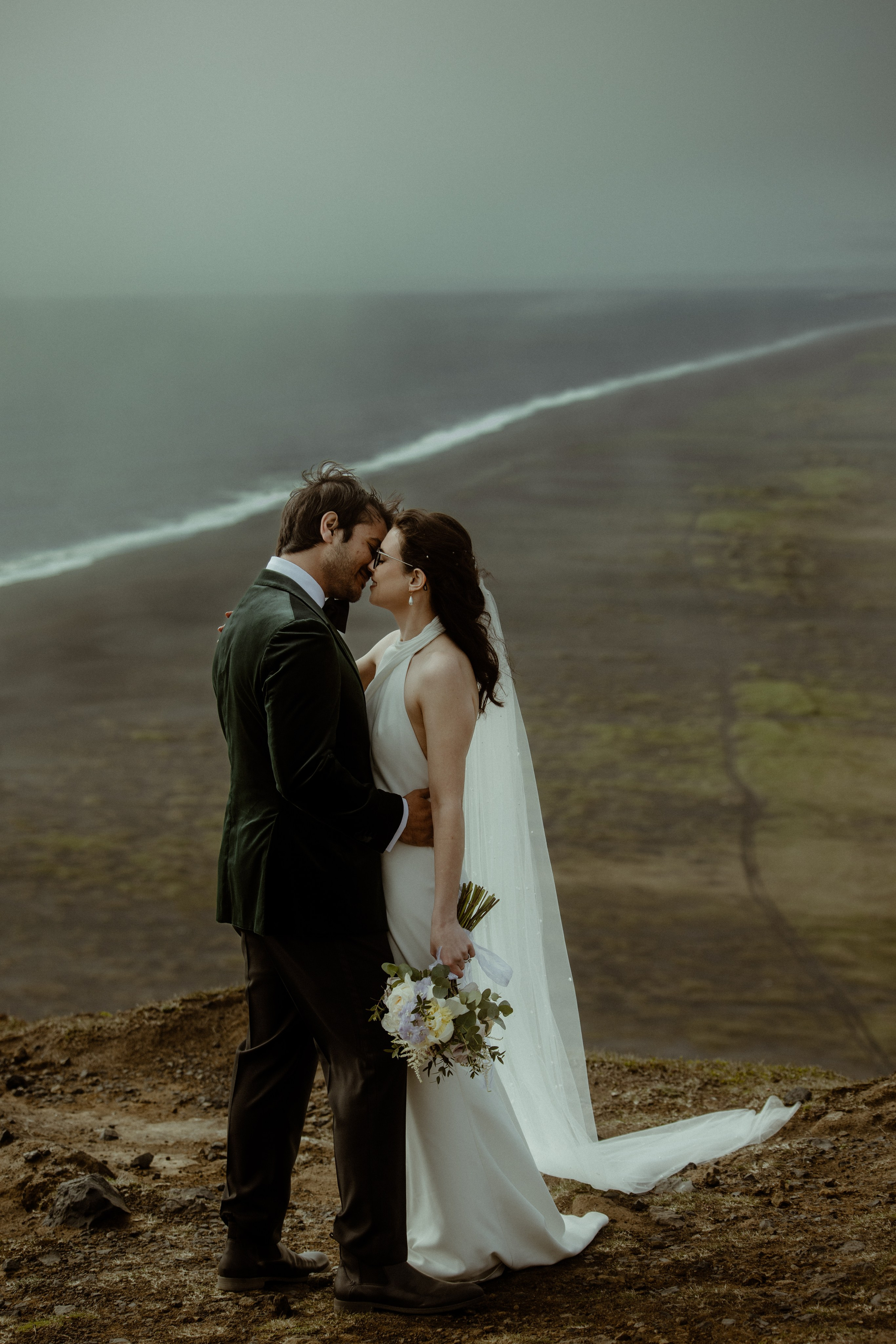 Iceland elopement at endless black sand beach. Iceland elopement photographer & videographer