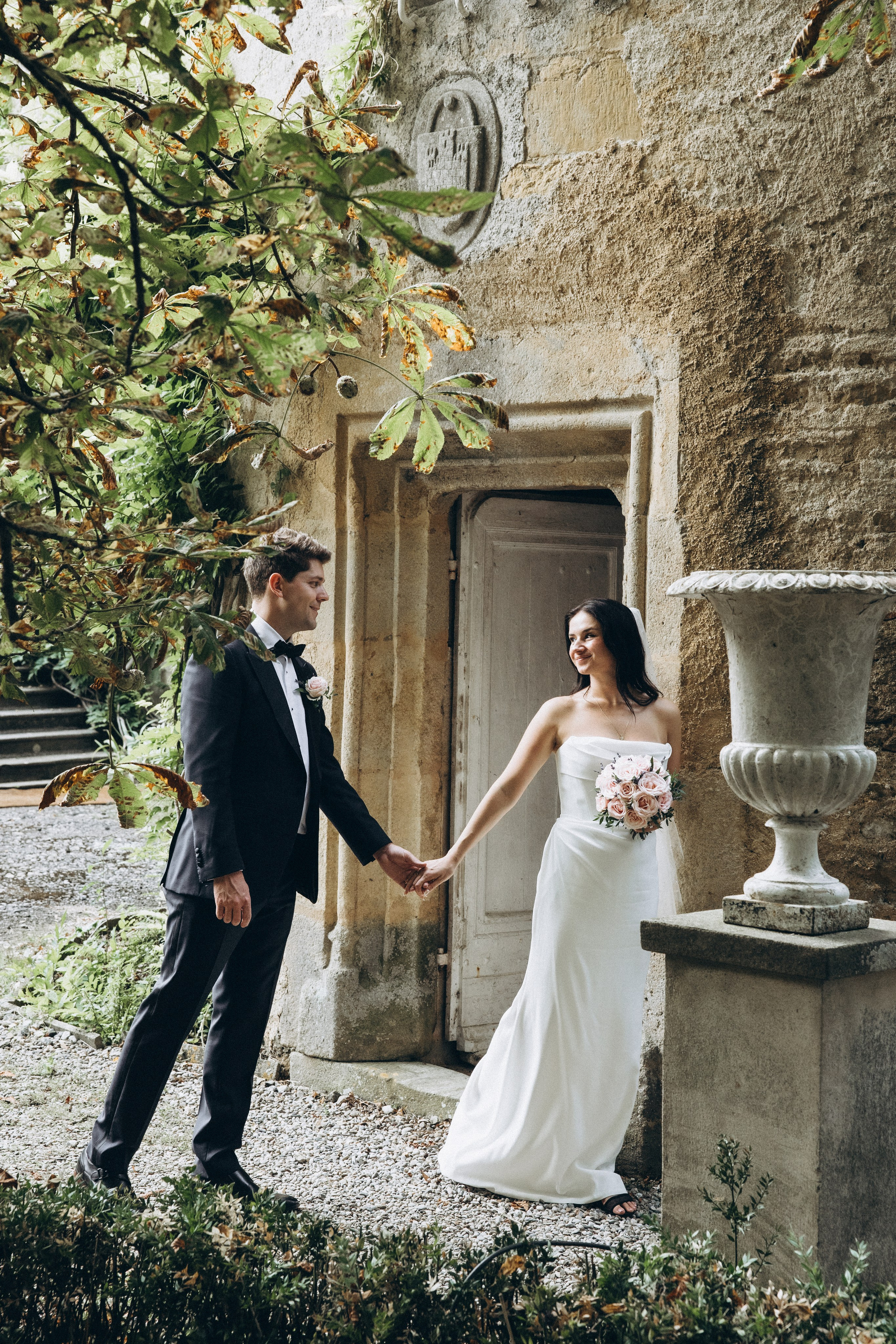 Bride and groom portrait inside historic French château wedding venue
