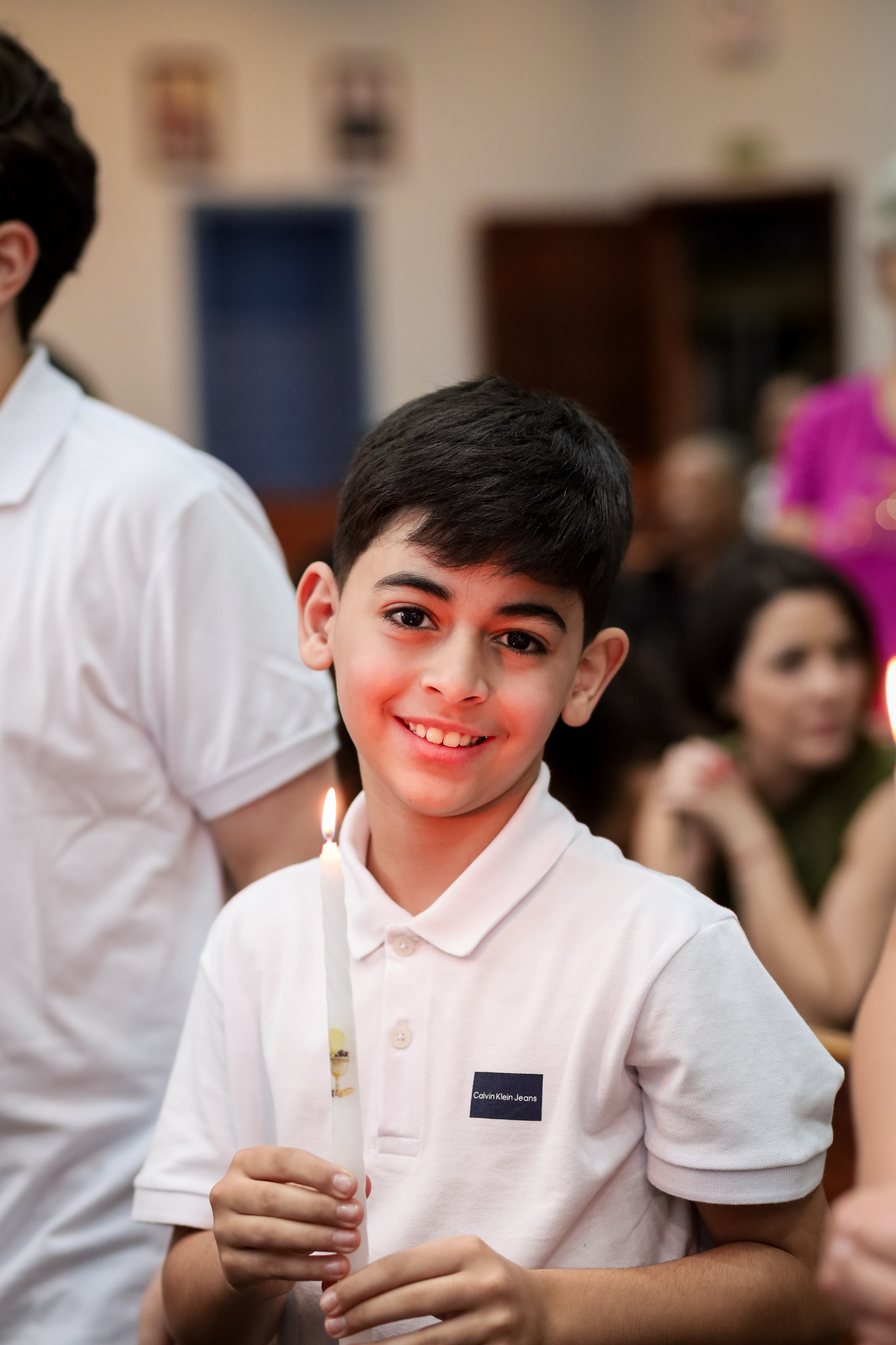 Primeira Eucaristia. Fotógrafo de momentos Sagrados