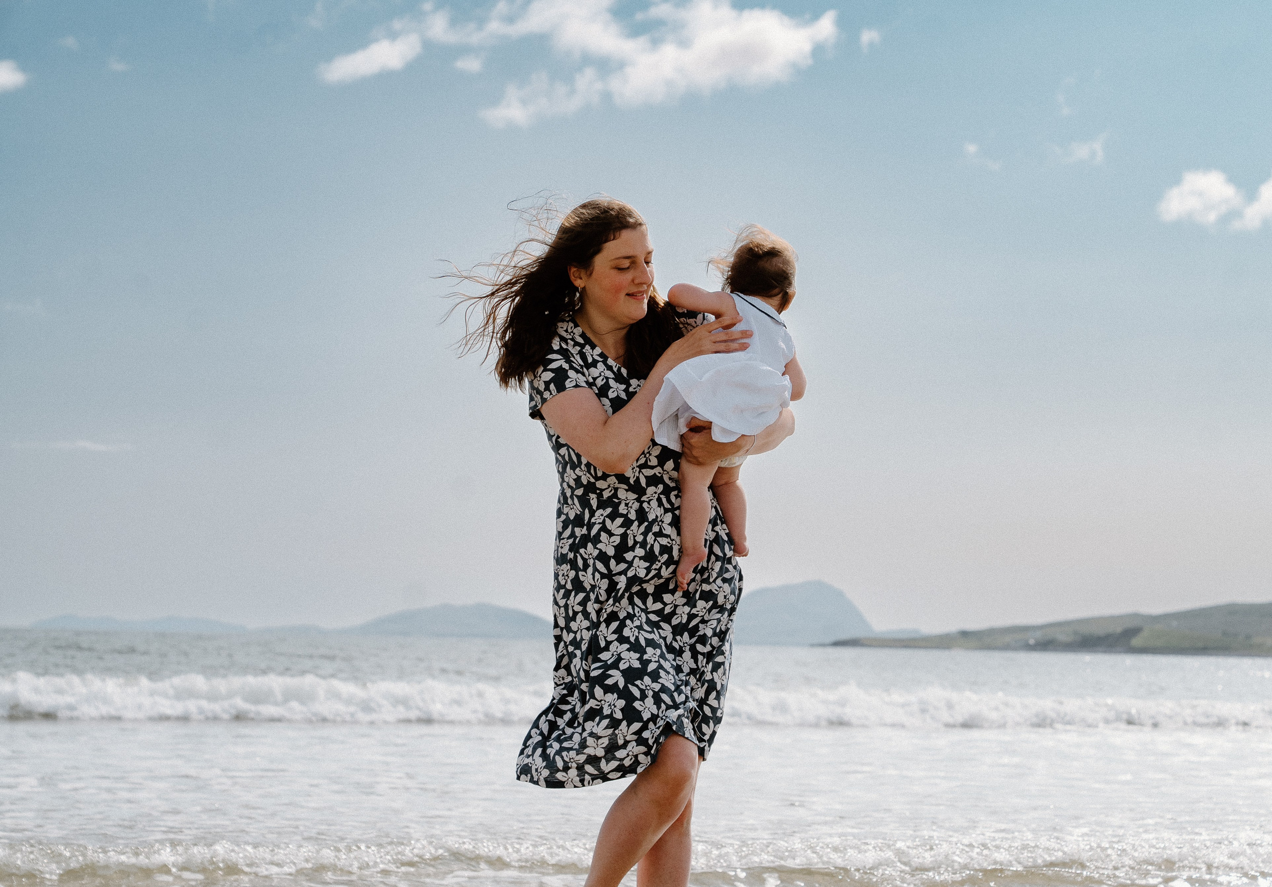 Darya and Mia at the ocean. Wedding and family photographer Ireland