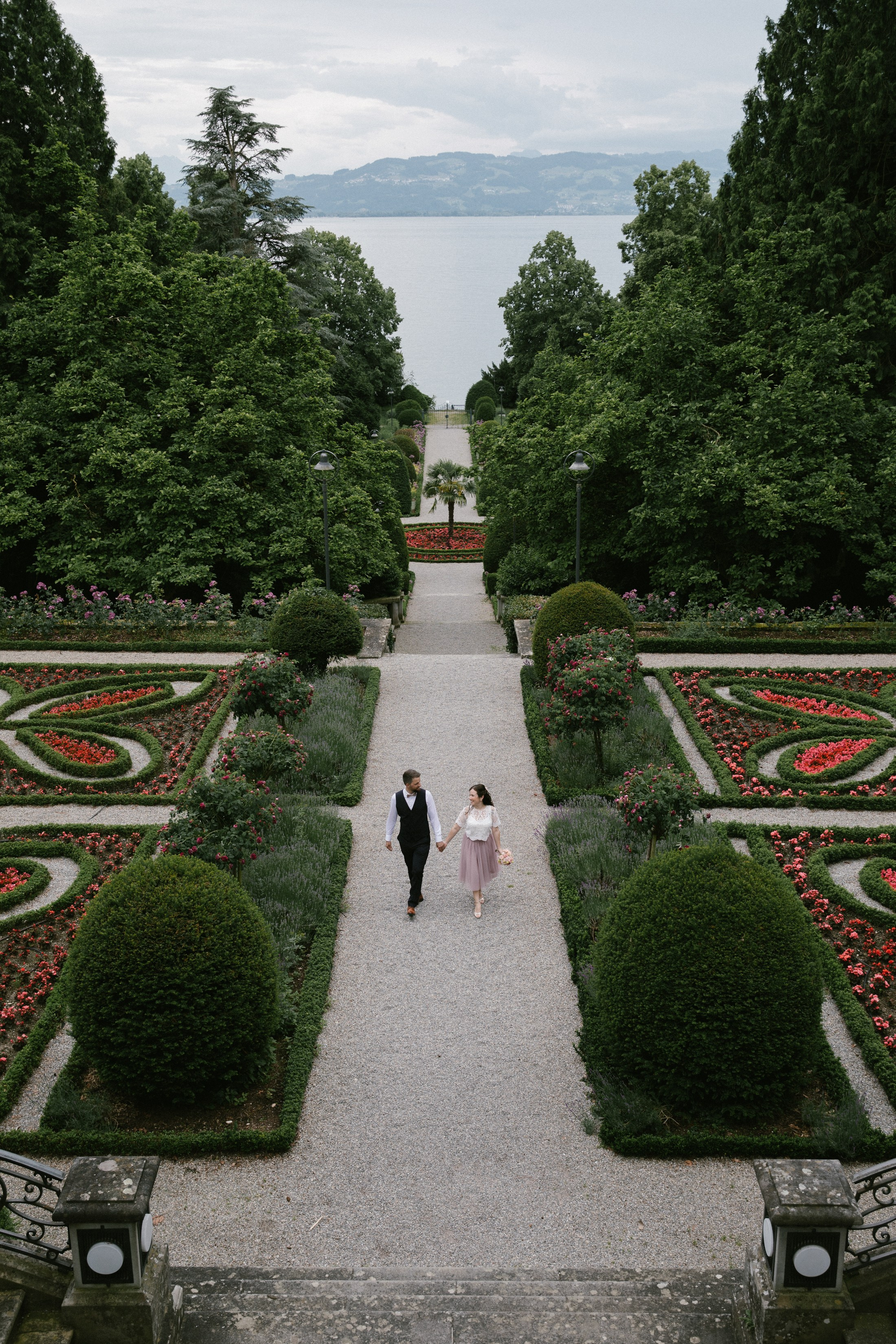 Wedding couple walking in gardens of Villa Leopold Lindau