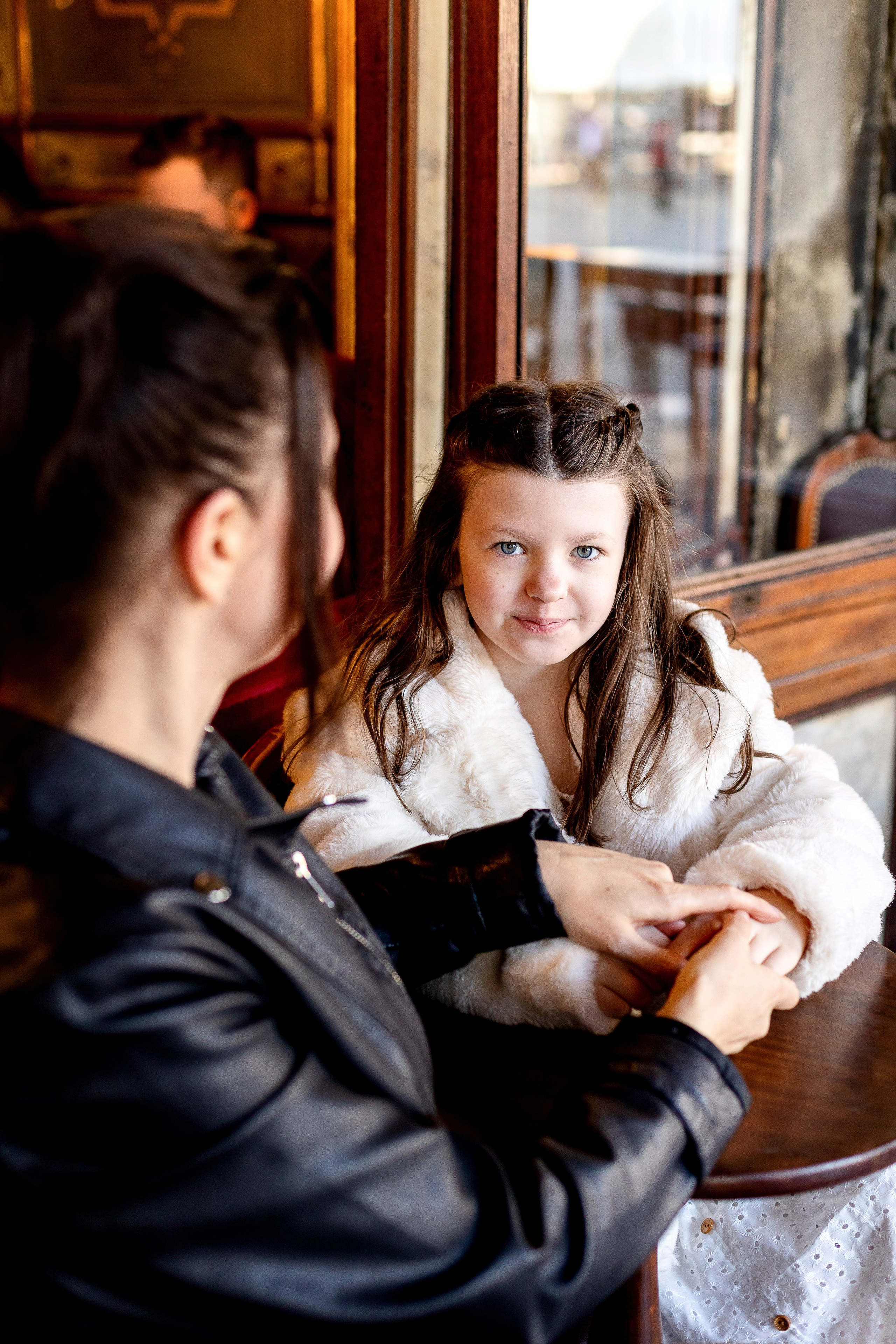 Mother and daughter at sunrise