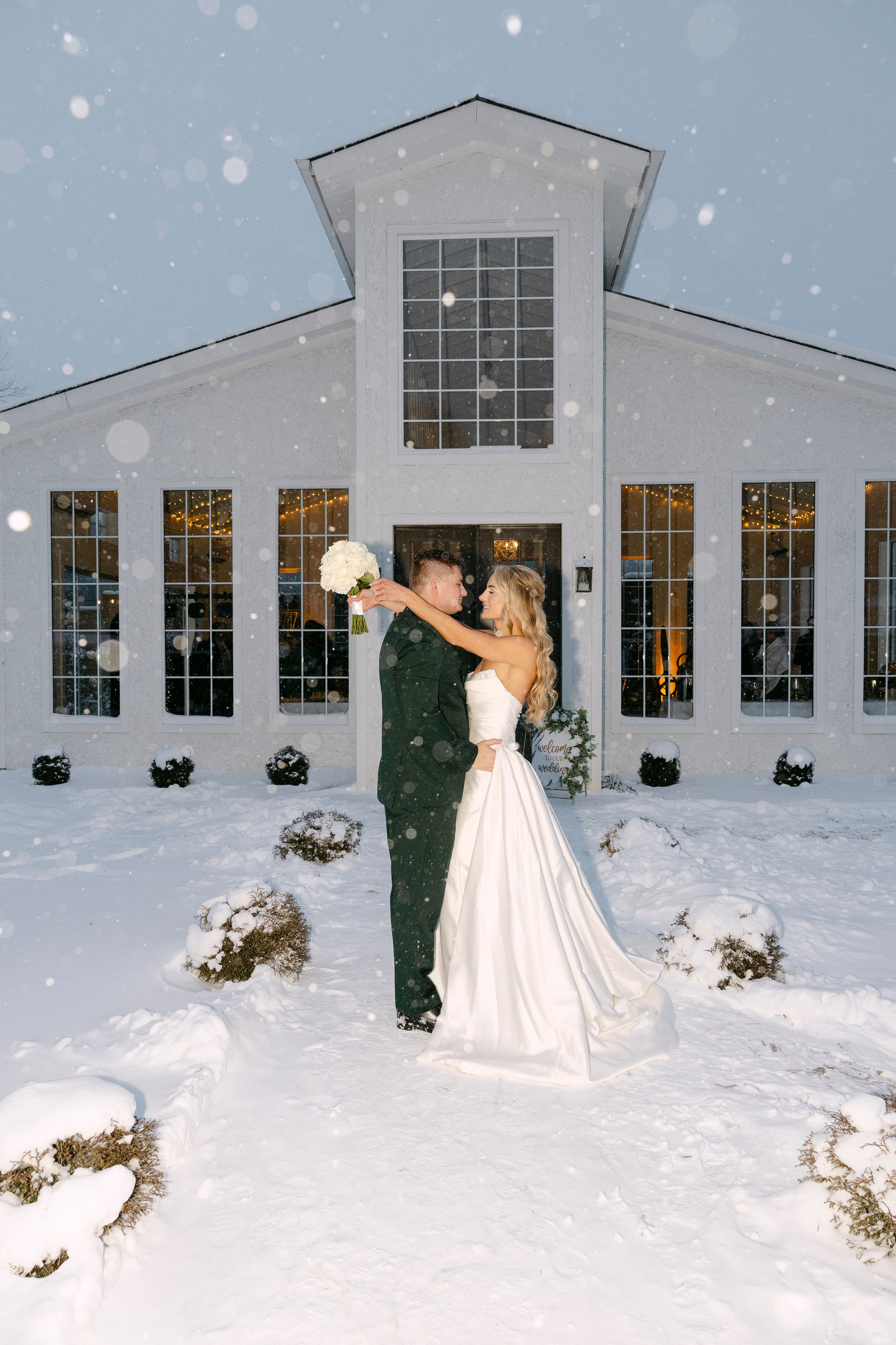 Winter Snow Wedding at Luxe Glass House at River Mill | A Rare & Romantic North Carolina Celebration. Wedding and portrait photography in Greenville SC