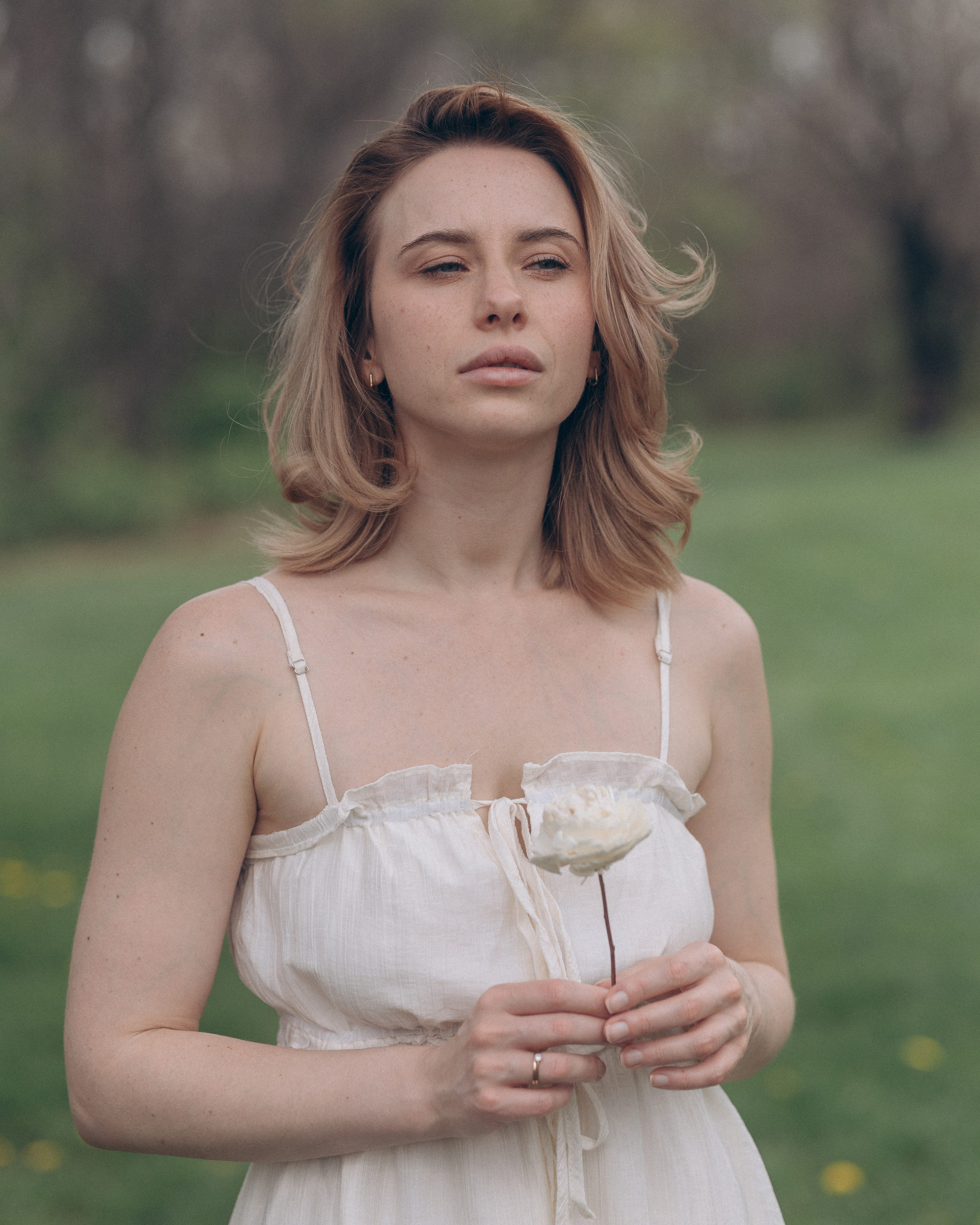 Natural portrait of a bride-to-be standing in a meadow near Columbus, Ohio