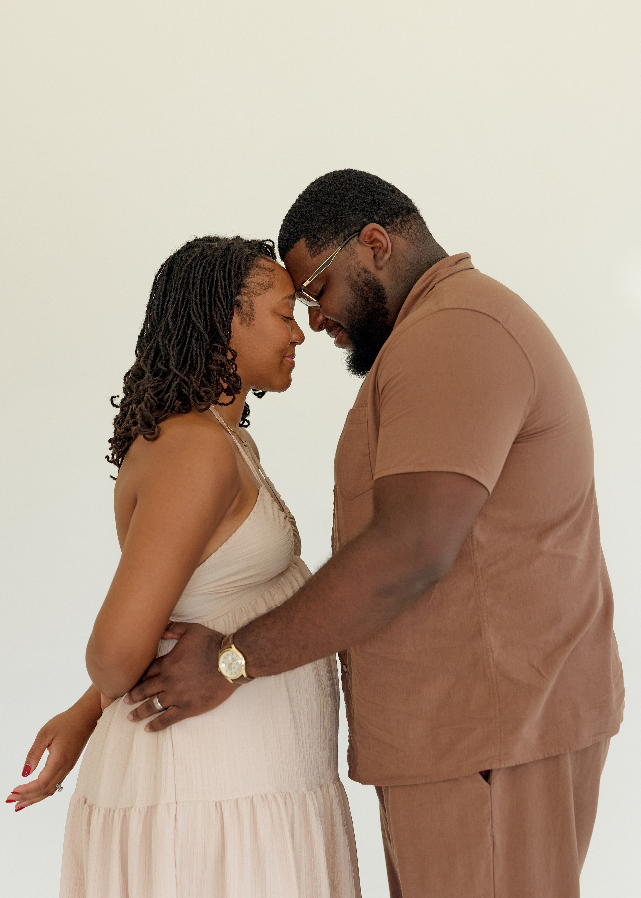 Face to face in a tender studio portrait, Columbus Ohio engagement photography