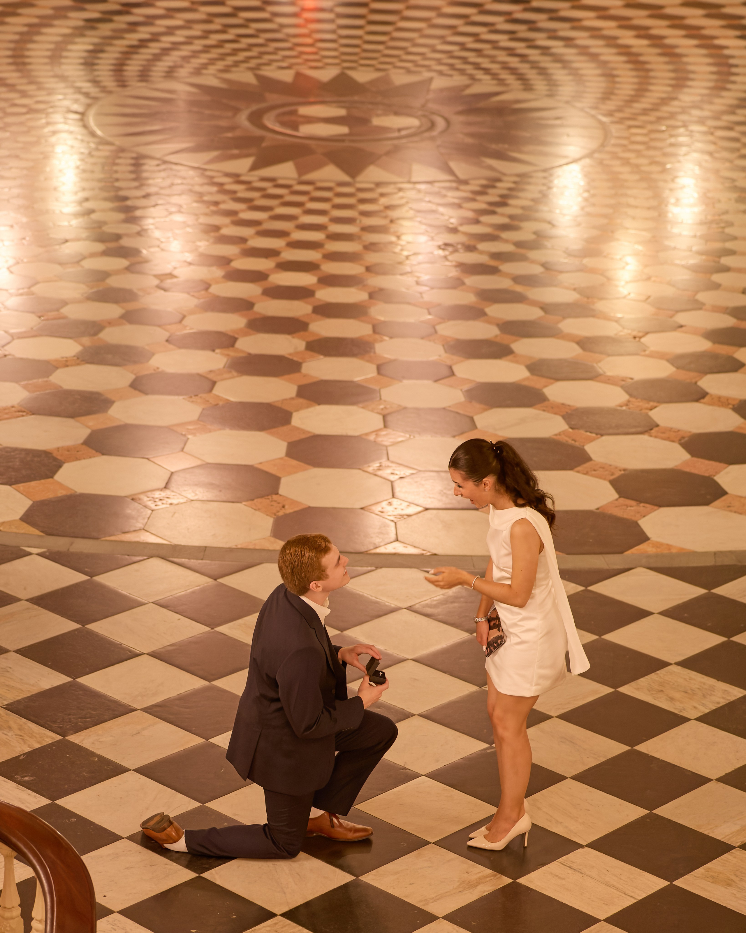 Indoor proposal on a checkered marble floor in Columbus, Ohio