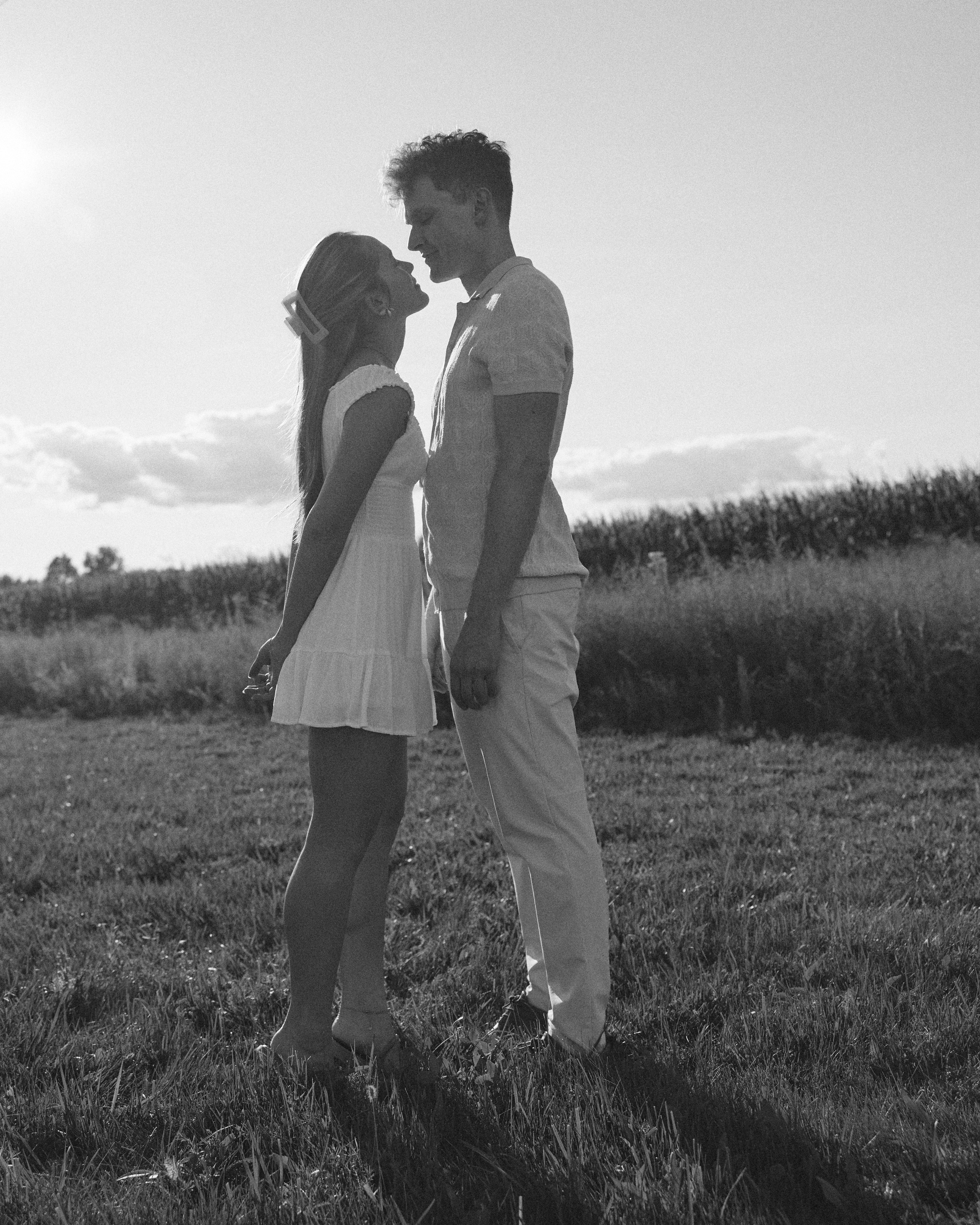  Black and white photo of a couple standing together in a field in Ohio