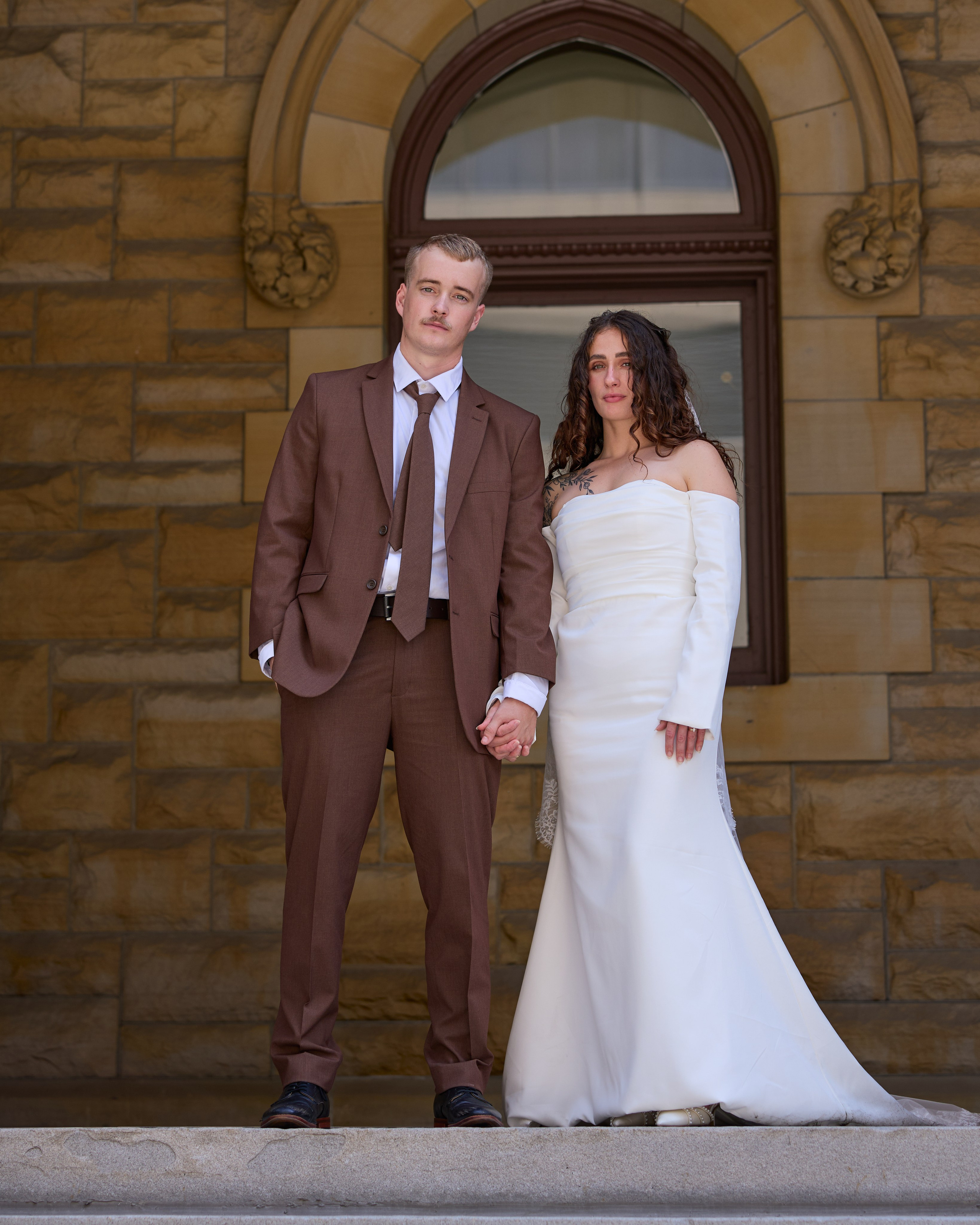 Classic portrait before a stone facade in downtown Columbus, Ohio