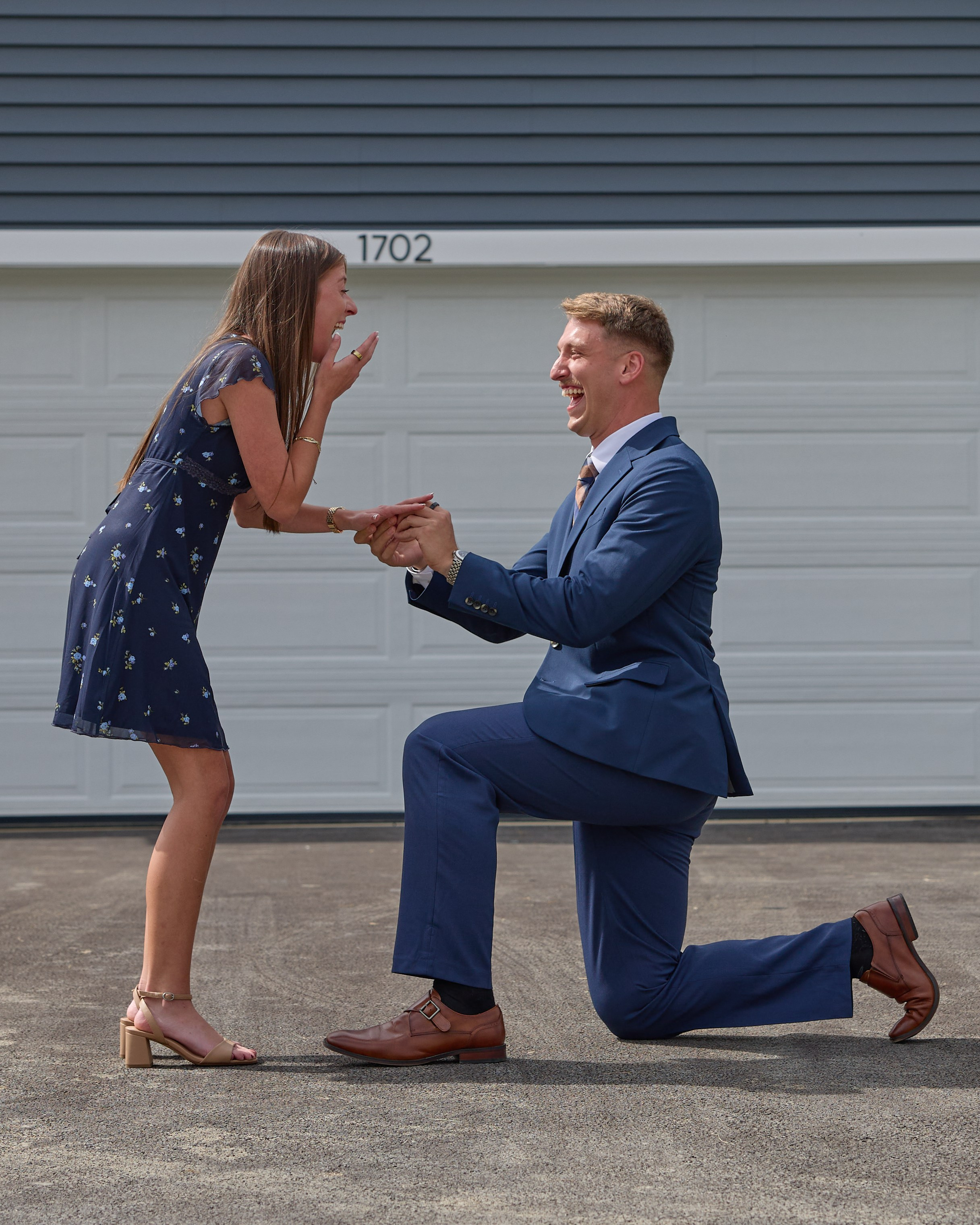 Surprise at-home proposal in front of the couple's new house in Columbus, Ohio