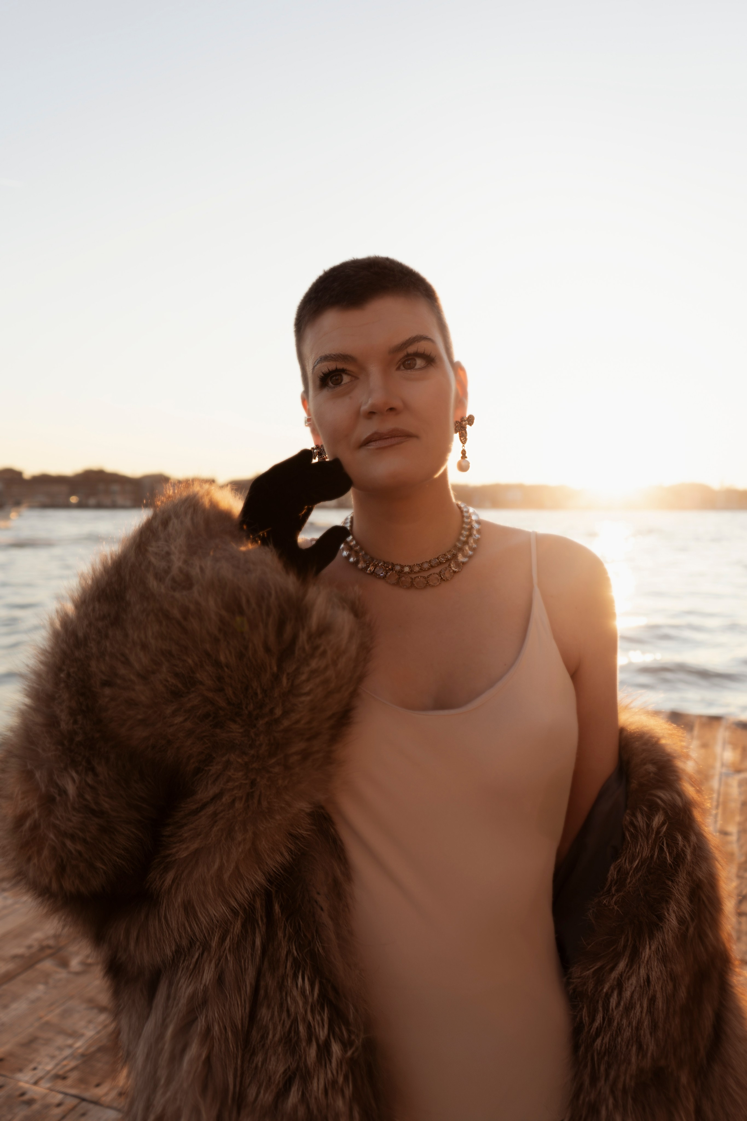  Luxury personal photoshoot in Venice on a private boat with flowing dress.