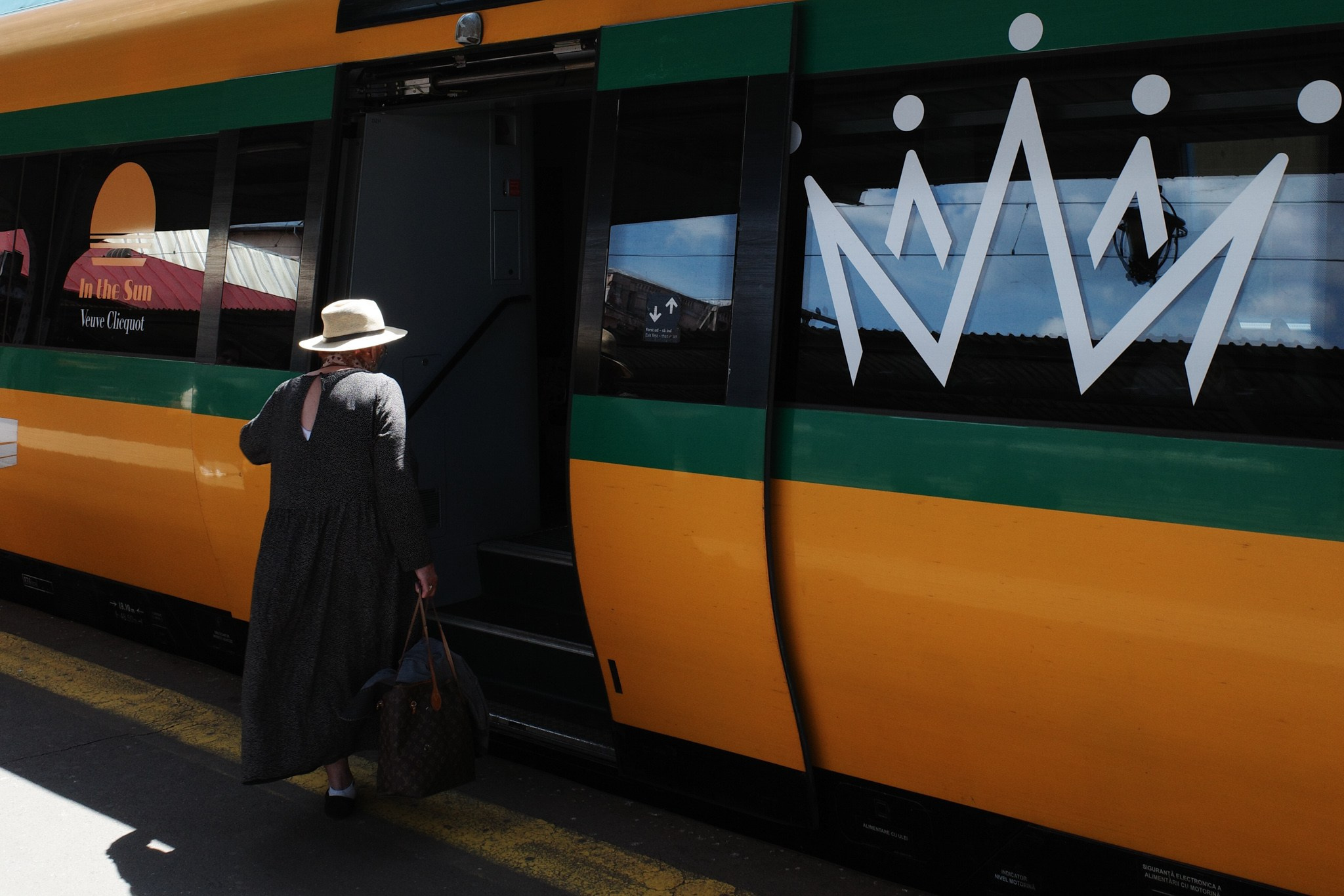 Color street. Humanistic street photographer in Bucharest
