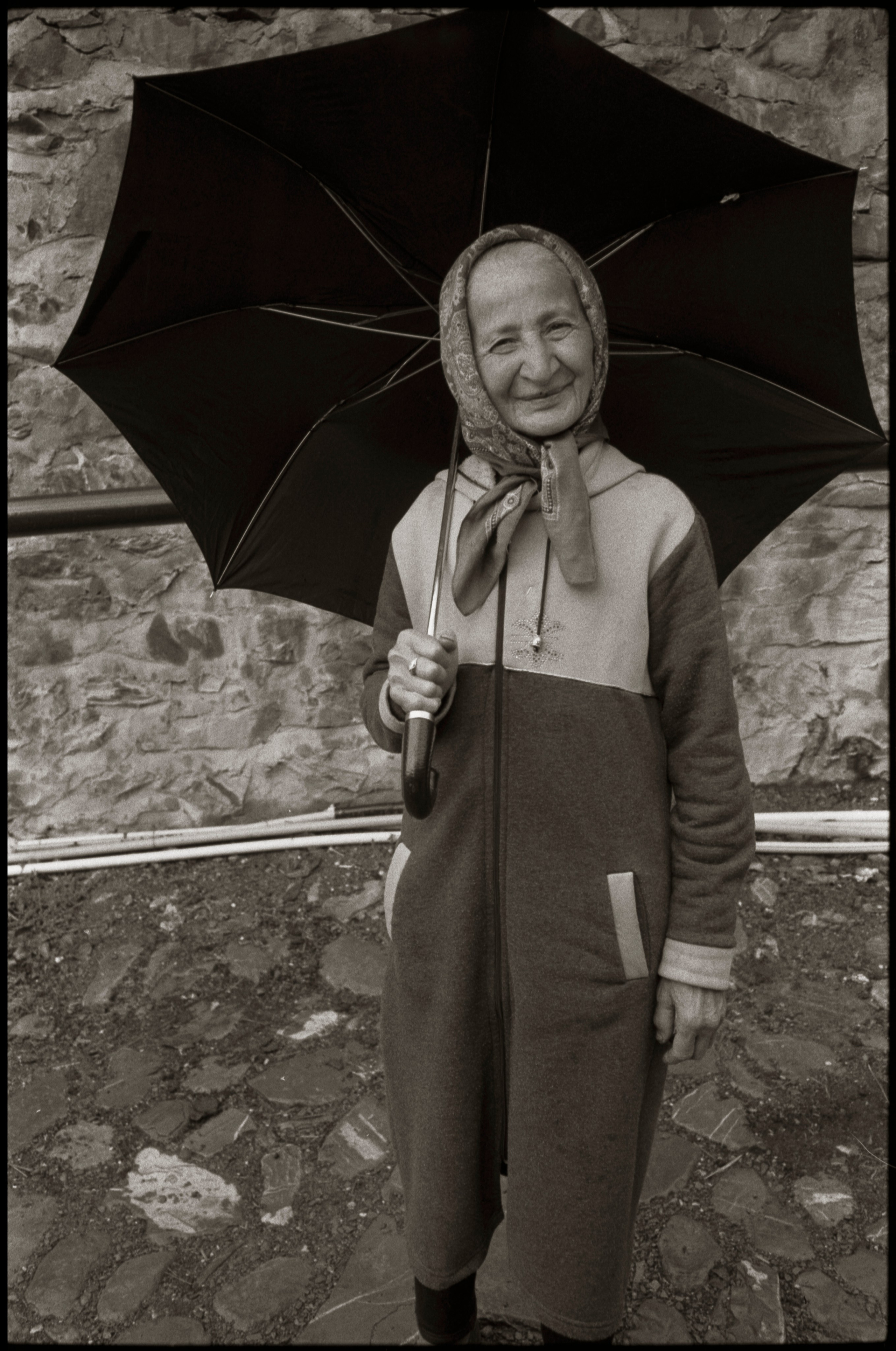 Woman with an umbrella. Kish, 2024