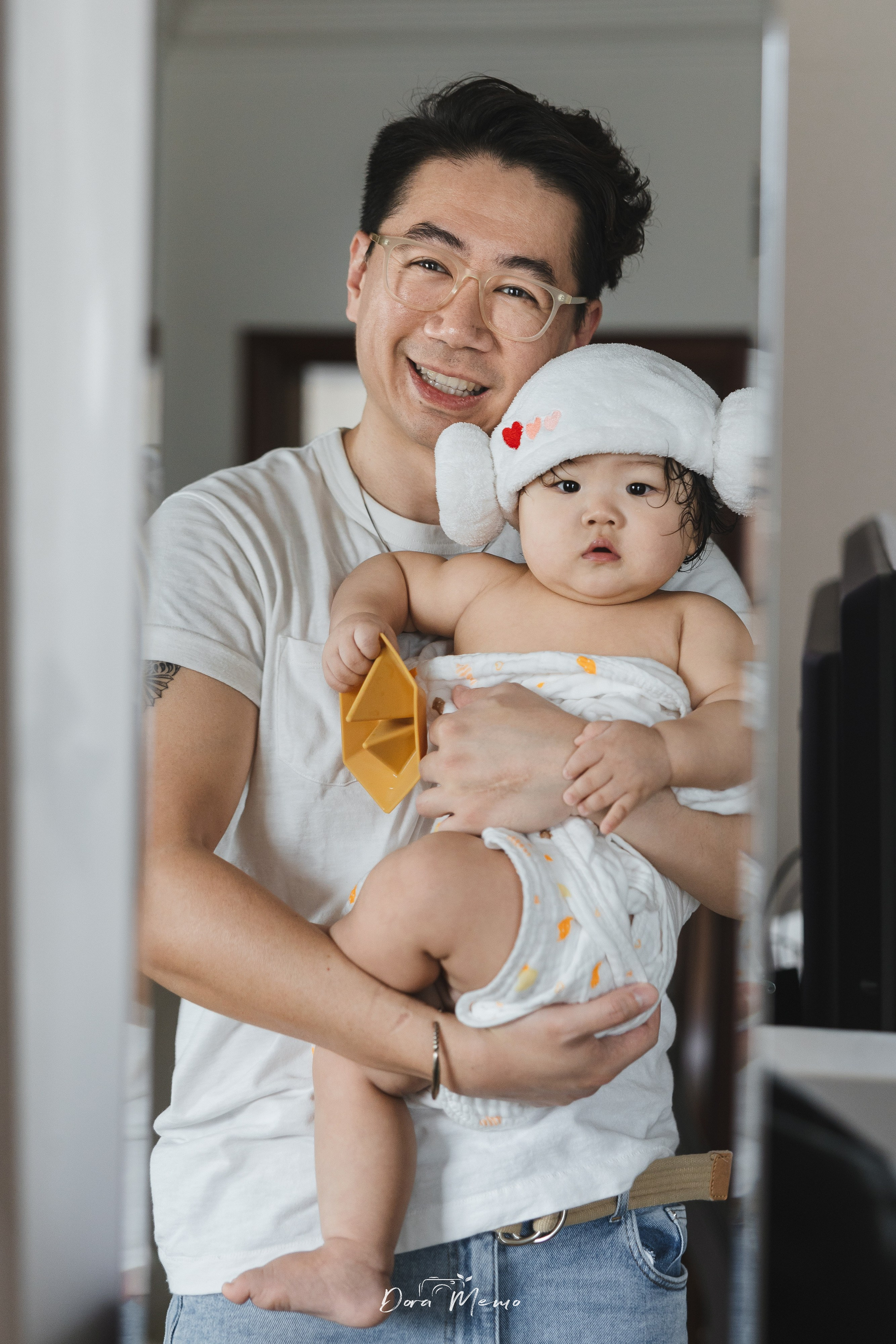 This page features a sweet family session with an adorable 8-month-old and their loving parents.