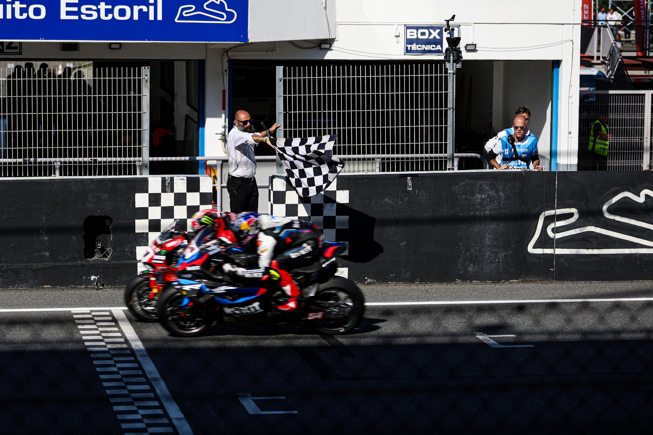 Nicolo Bulega Ducati and Toprak Razgatlıoğlu BMW finish line at Estoril Circuit, Estoril Portugal 2024