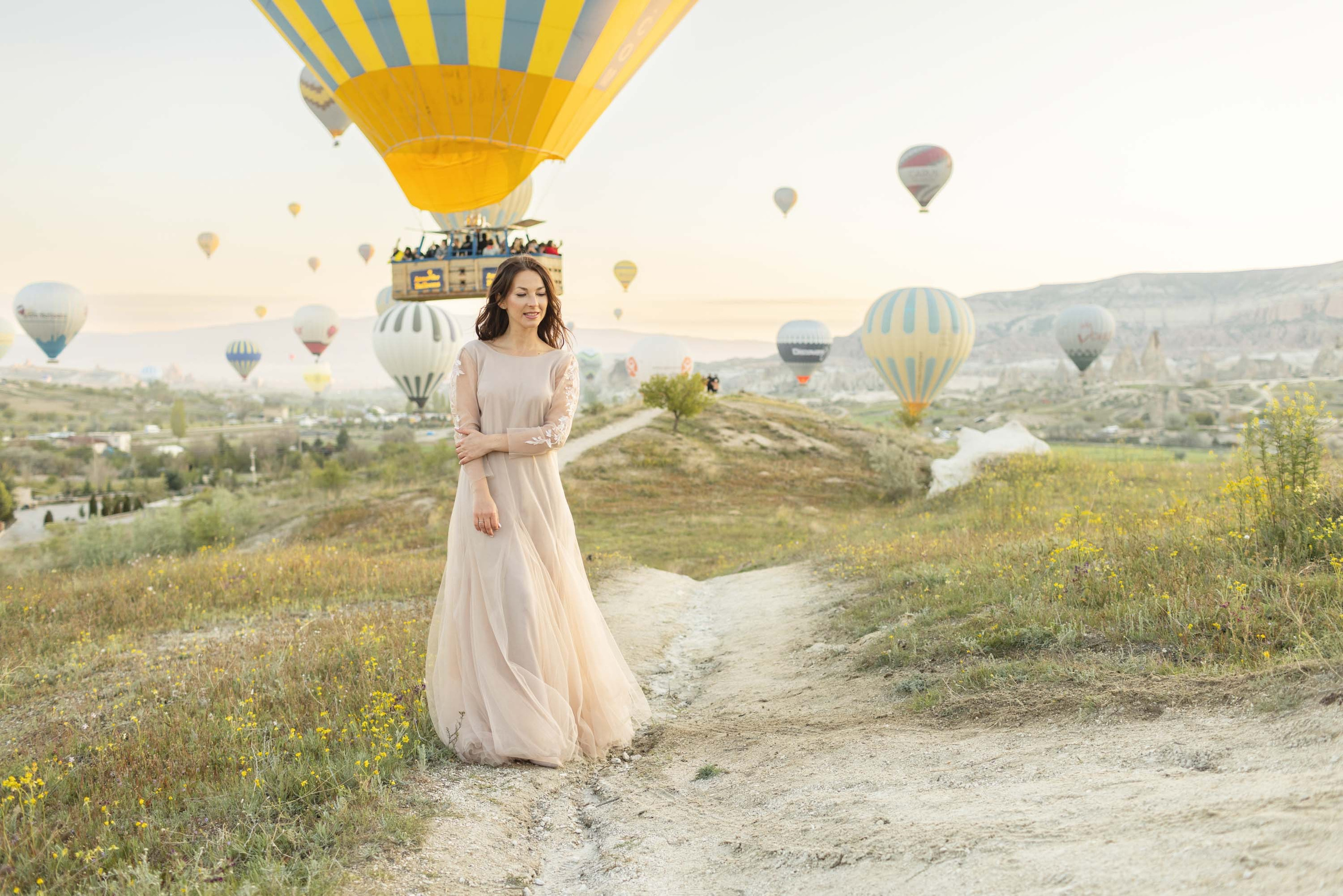 Magical Wedding Photoshoot in Cappadocia: Balloons, Caves, and Valleys. Julia Ganch I Fashion Wedding Photography I Cappadocia Turkey