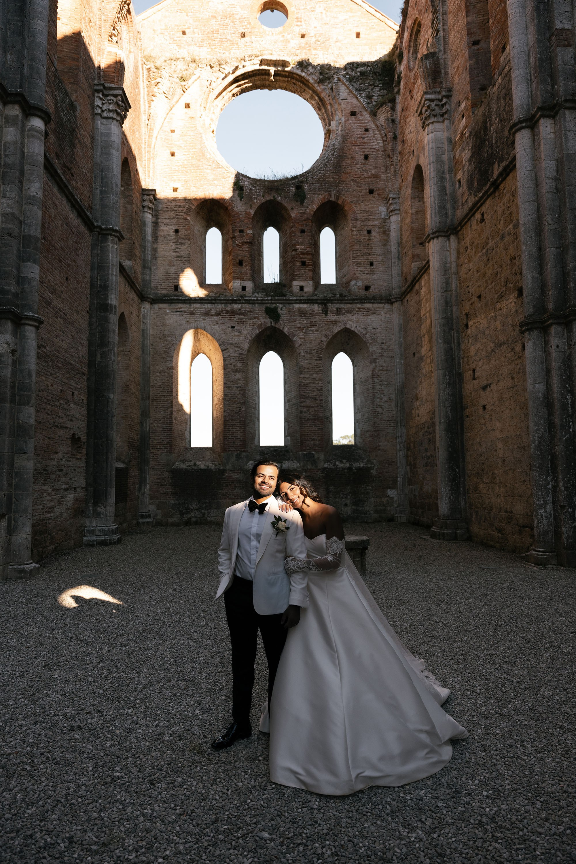 Ginevra and Avi — Abbazia di San Galgano, Tuscany. Destination Wedding Photographers and content creators based in Spain