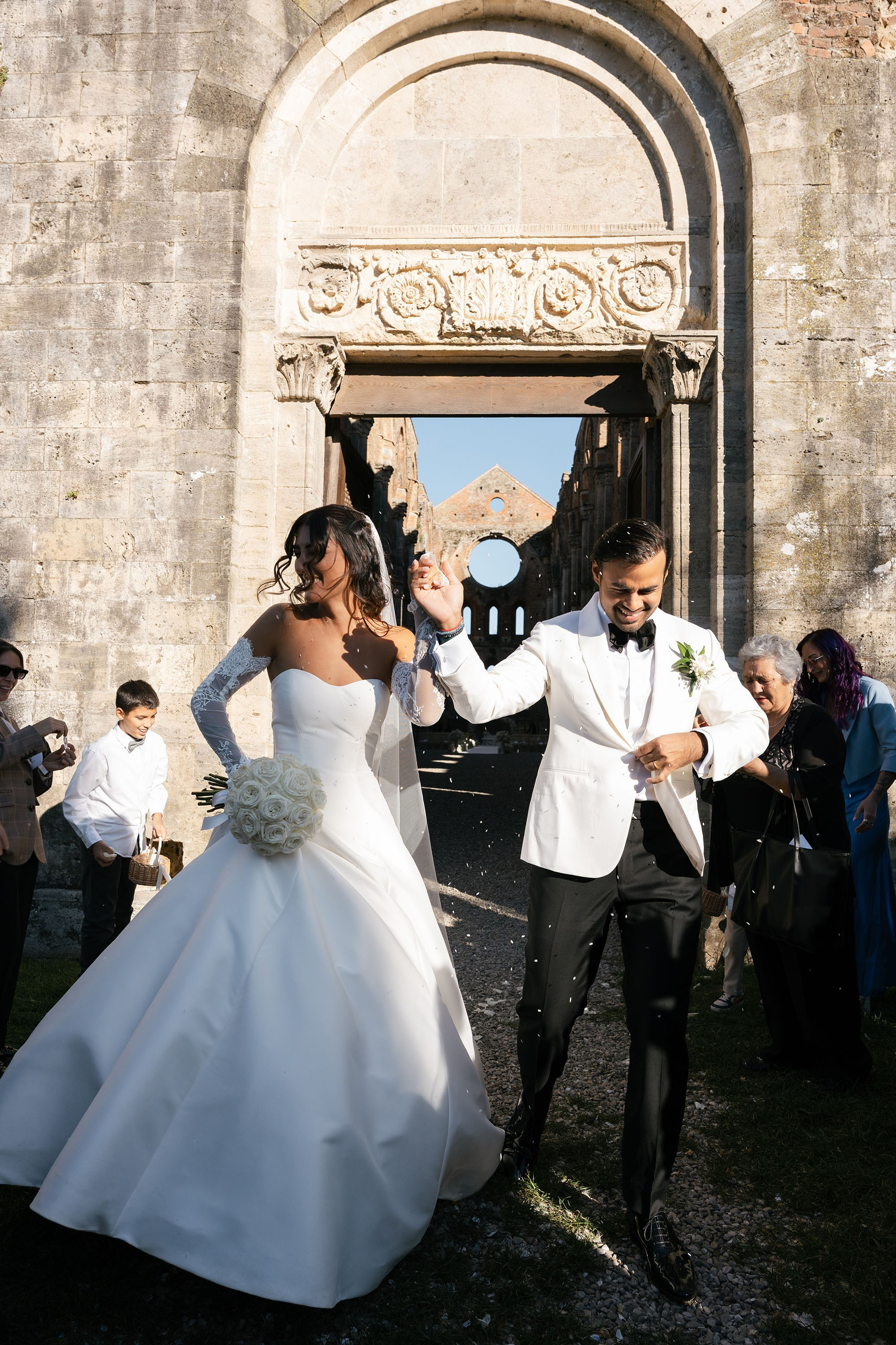 Ginevra and Avi — Abbazia di San Galgano, Tuscany. Destination Wedding Photographers and content creators based in Spain