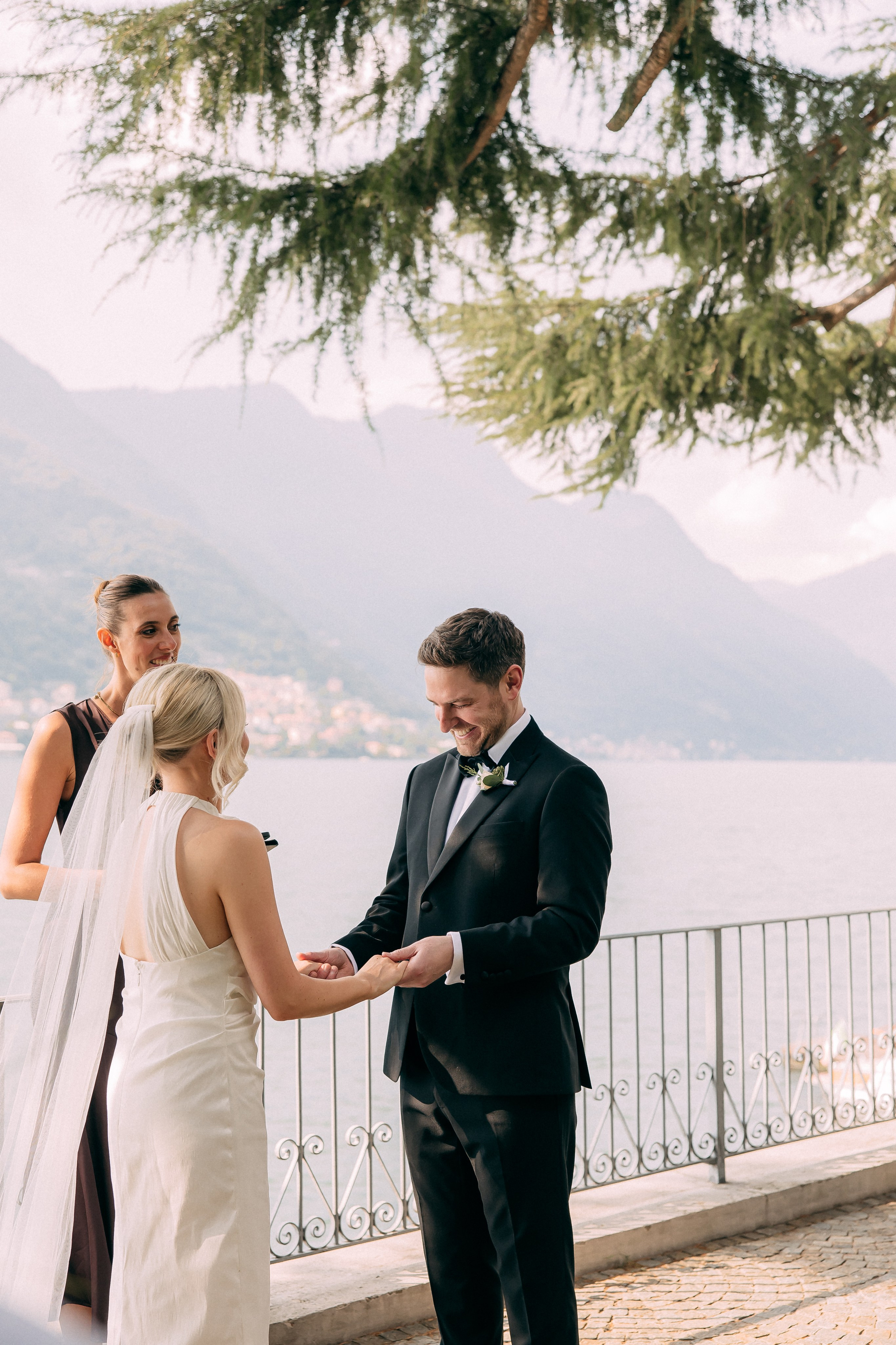 Bride and groom exchanging vows at Villa Lario, Lake Como, Italy