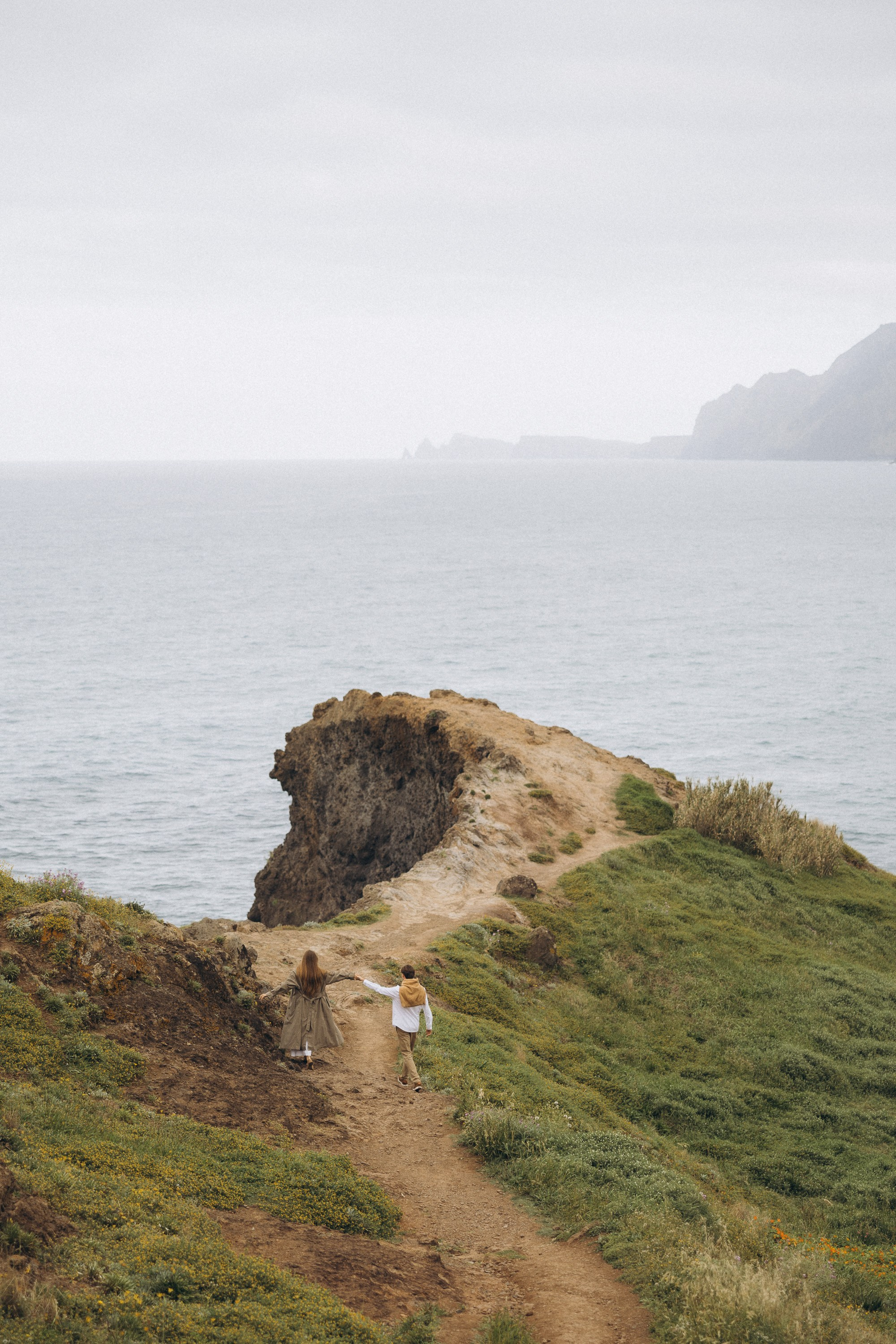 Cinematic proposal on the edge of Madeira cliffs with ocean views.
