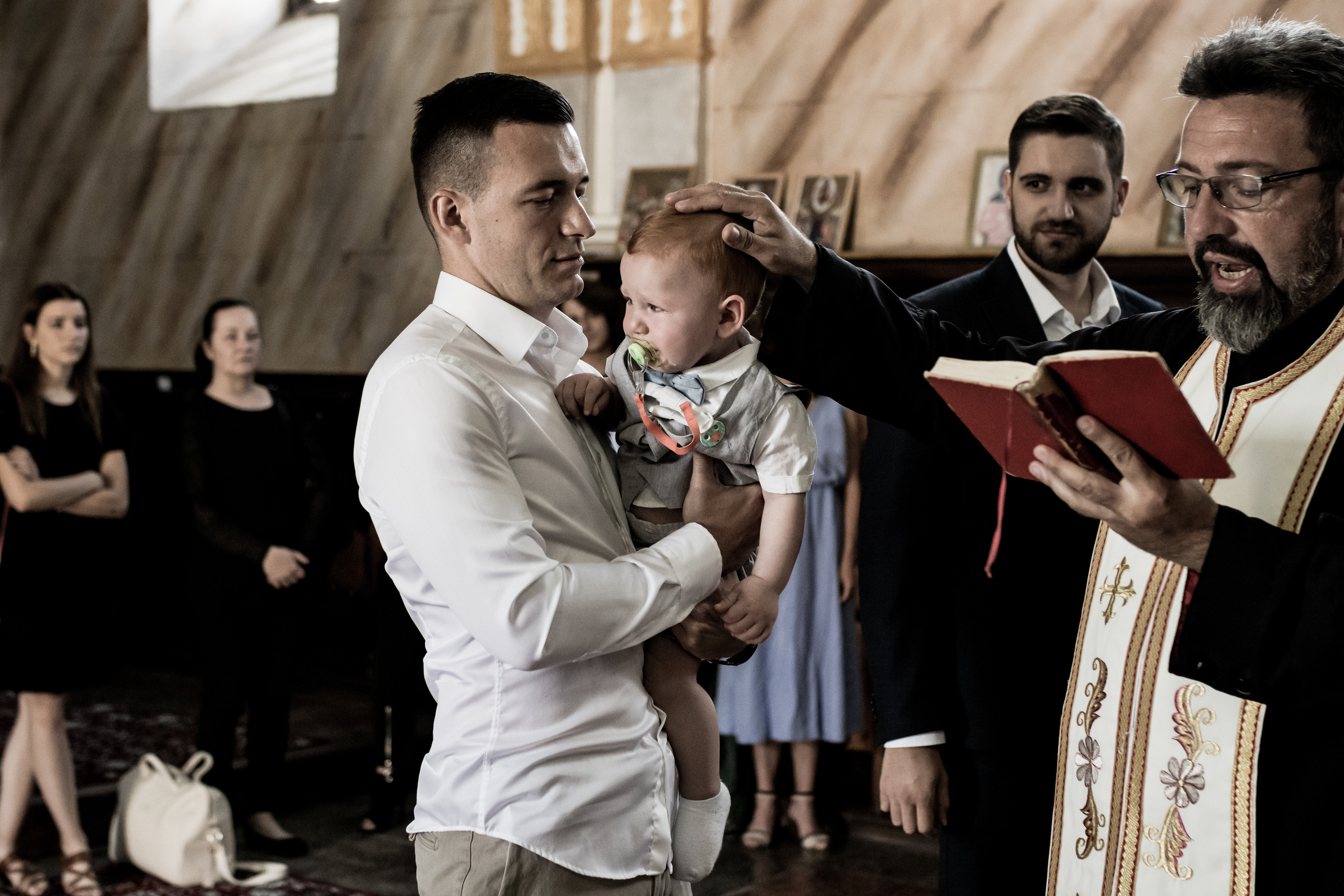 fotografija čina krštenja