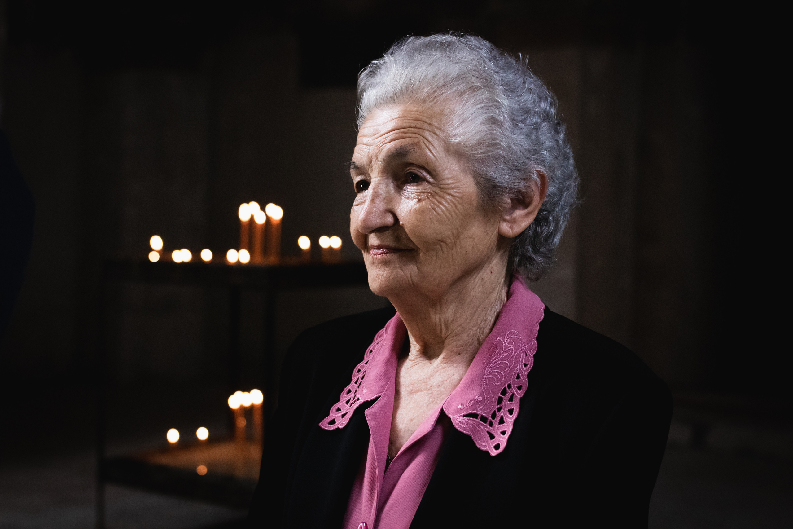 fotografija starice na krštenju