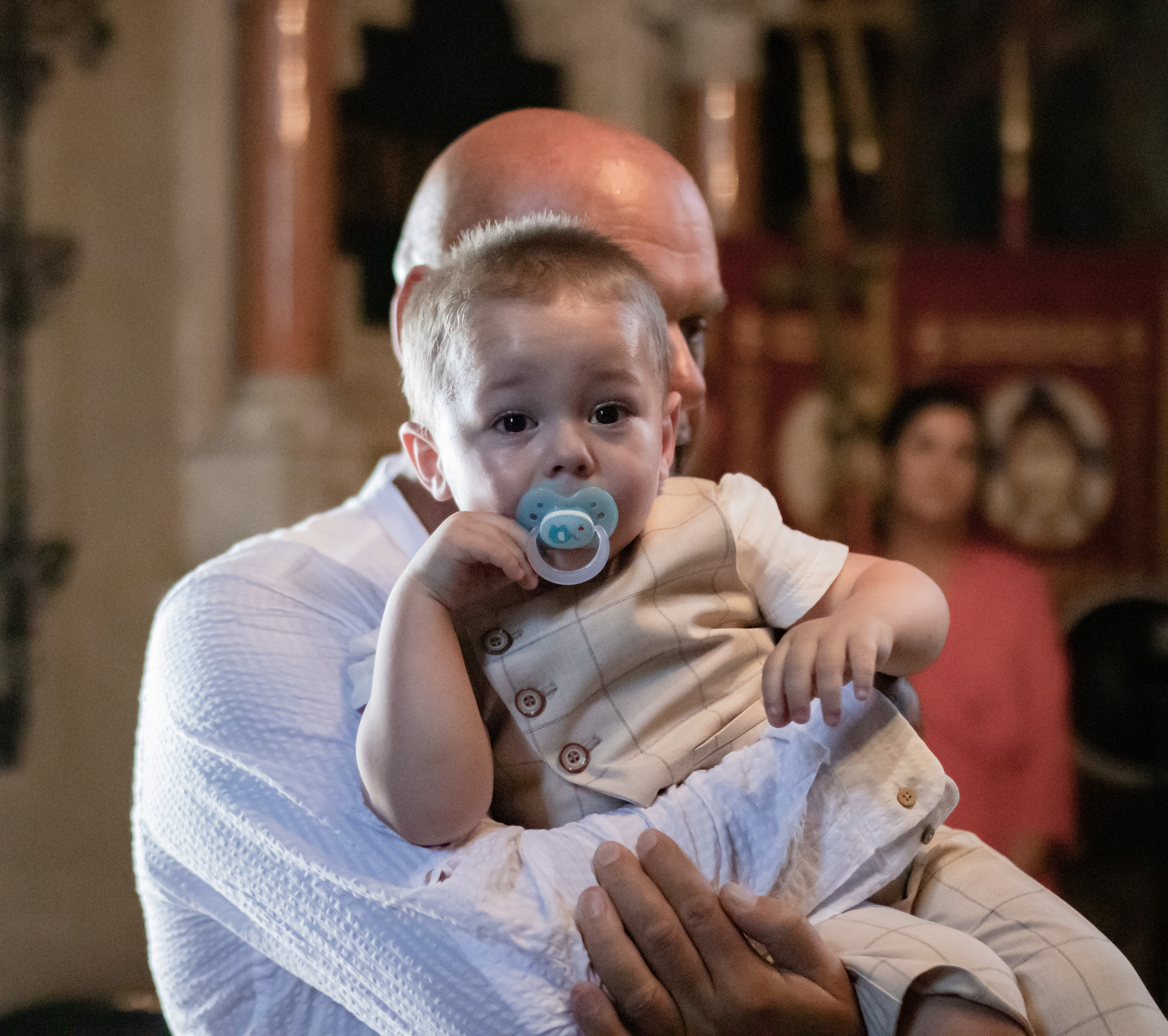 fotografisanje malog deteta na krštenju