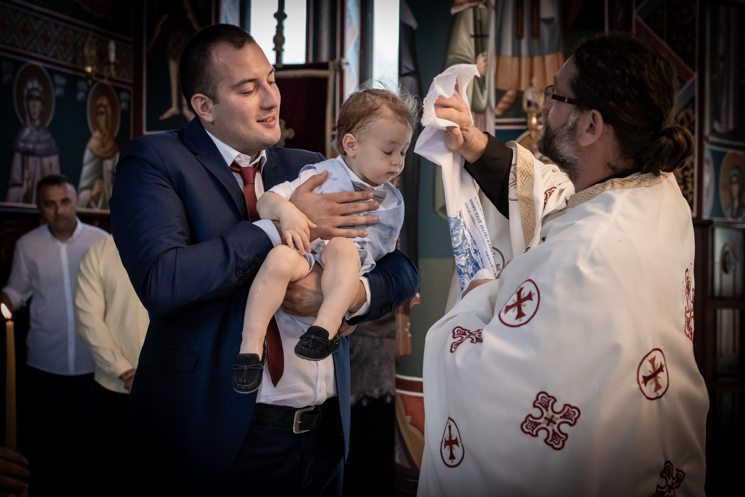 momenat sa krštenja prenesen na fotografiju