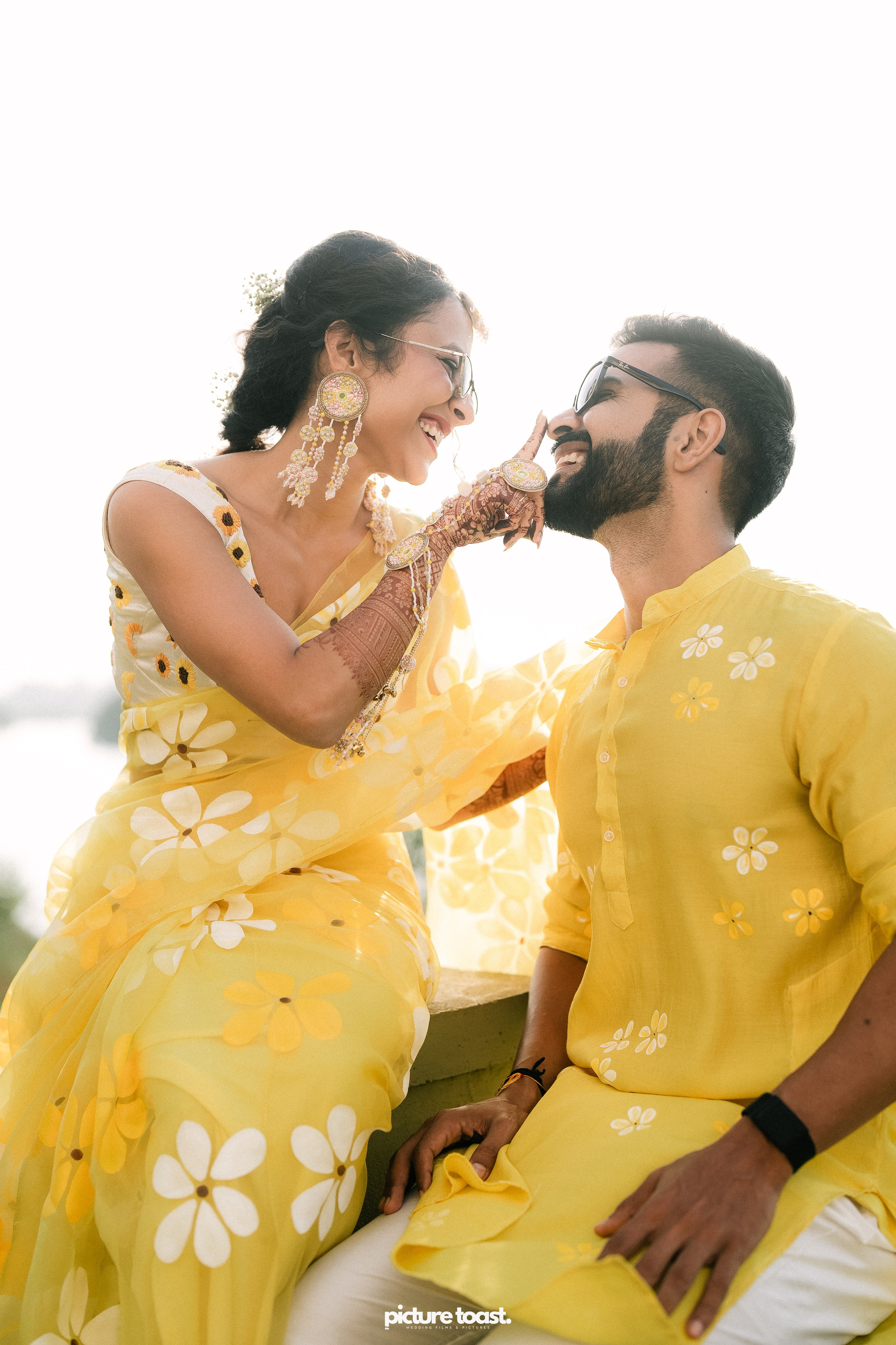 Haldi Hues Ft. Baebie & Goyal. Fine art Wedding Photographers in India & Canada