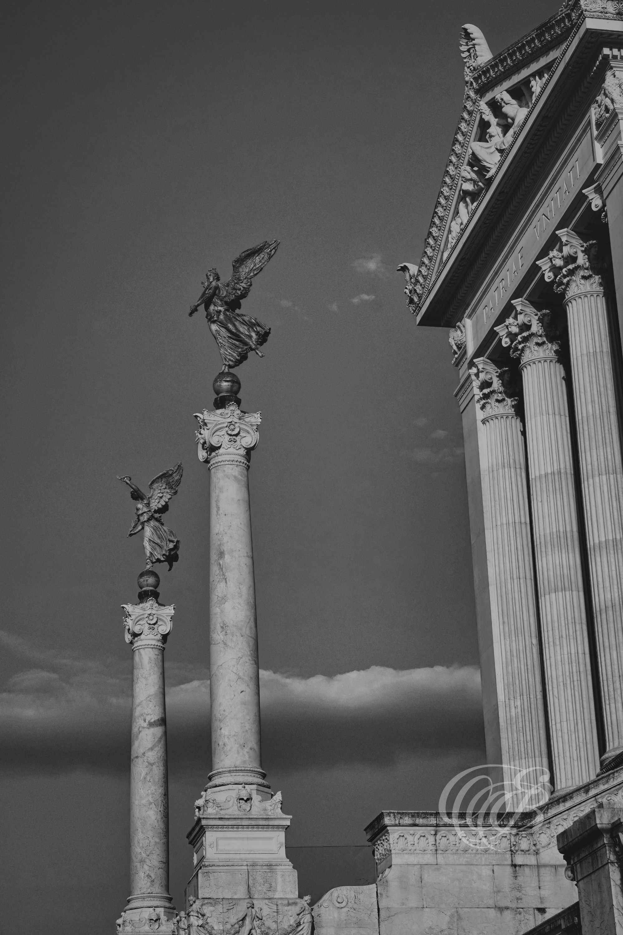 Rome Italy - Angels of The Victor Emmanuel II Monument - B&W - Eduardo Bartoli Fine Art Photography - Black and white fine art photograph of the angels at the Victor Emmanuel II Monument in Rome, Italy – photography by Eduardo Bartoli.