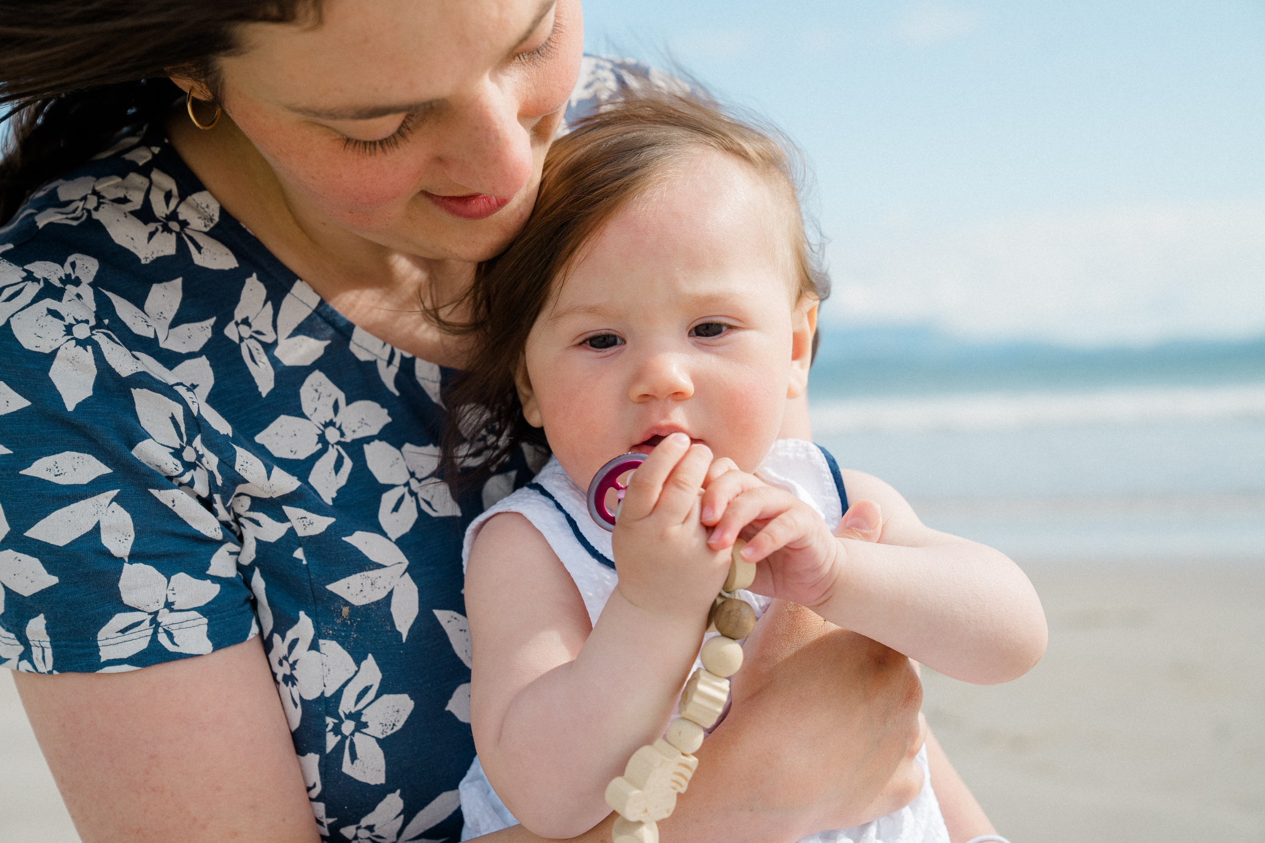 Darya and Mia at the ocean. Wedding and family photographer Ireland