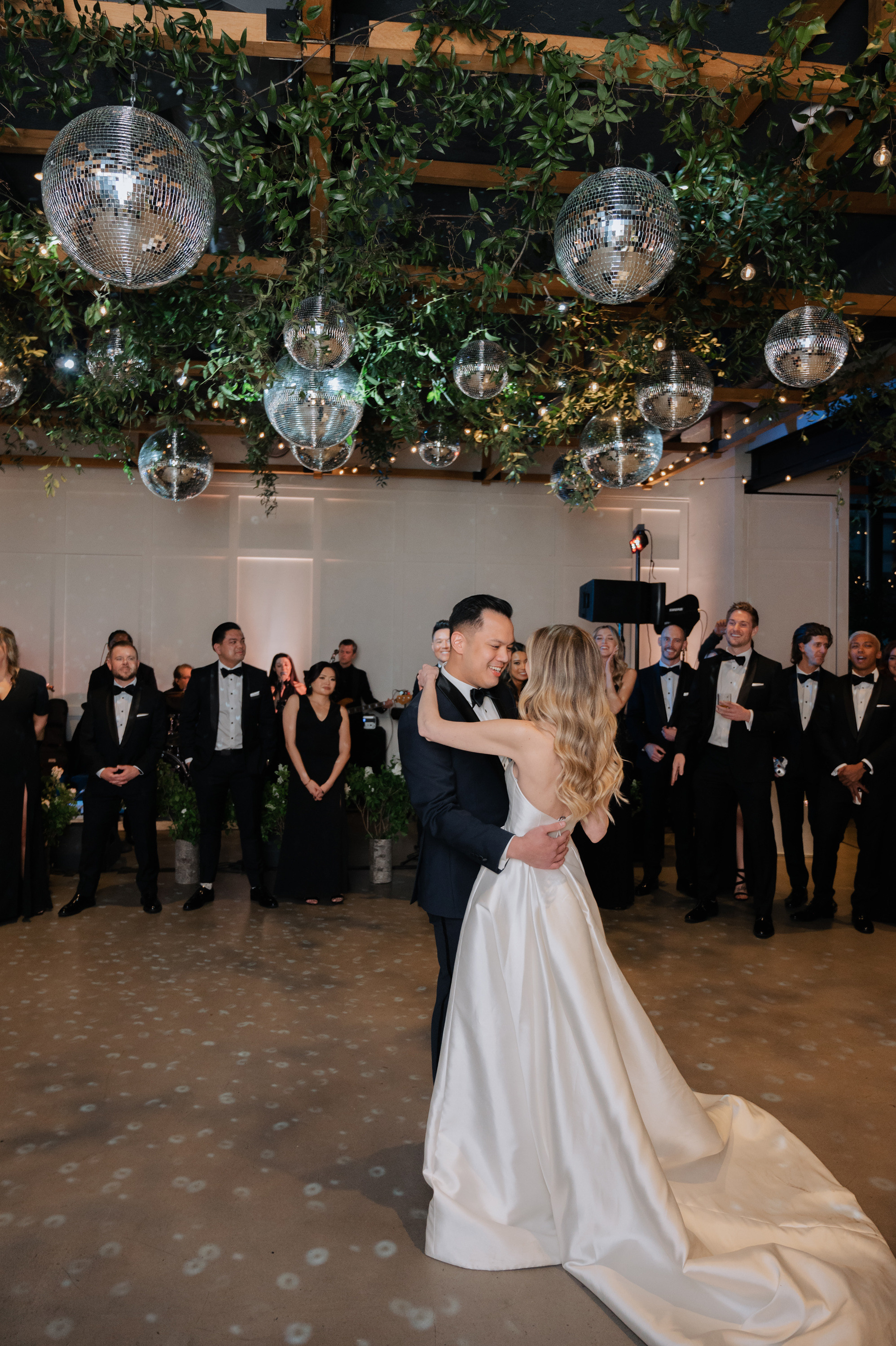 a bride and groom sharing a first dance