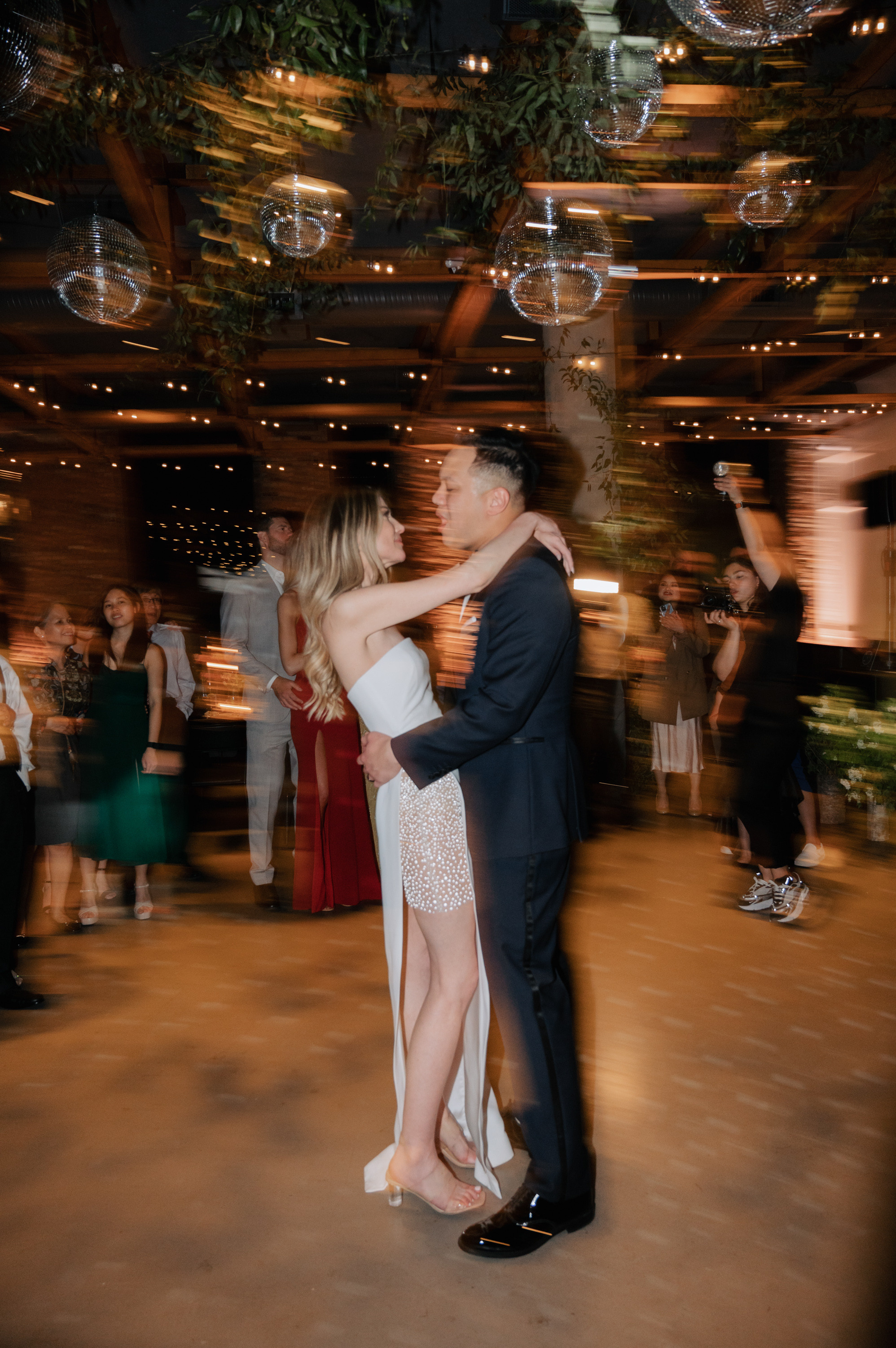 a couple dancing in a dance hall