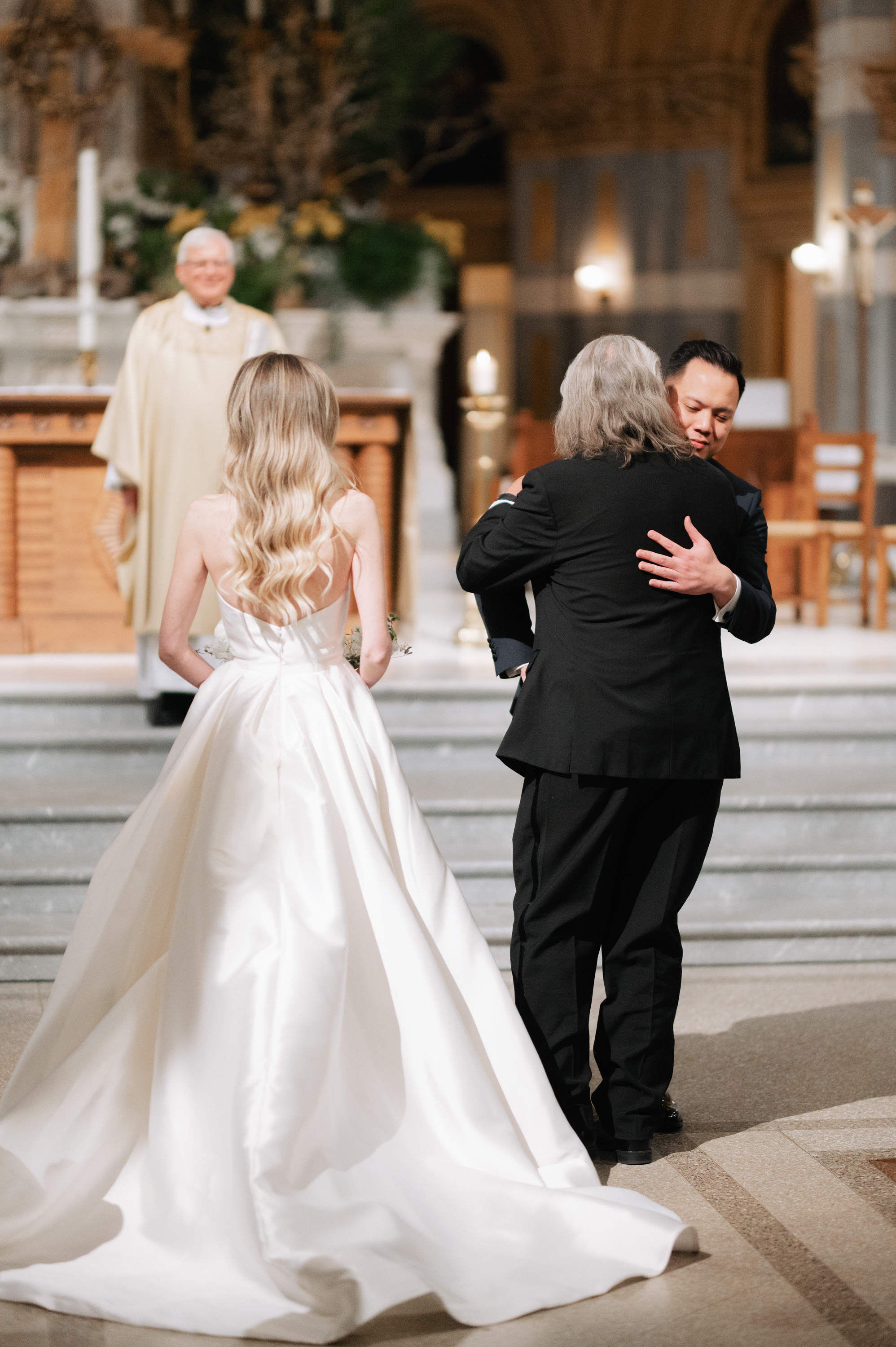 a bride and her father walking down the aisle