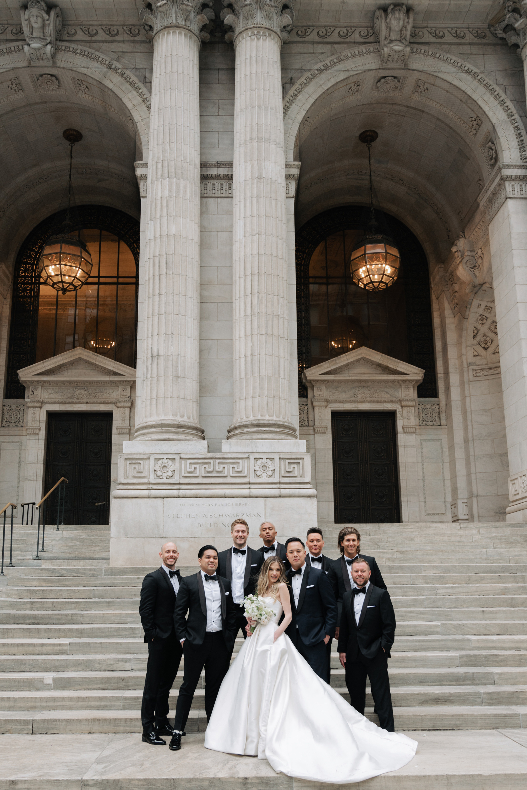 a group of people standing on a set of stairs