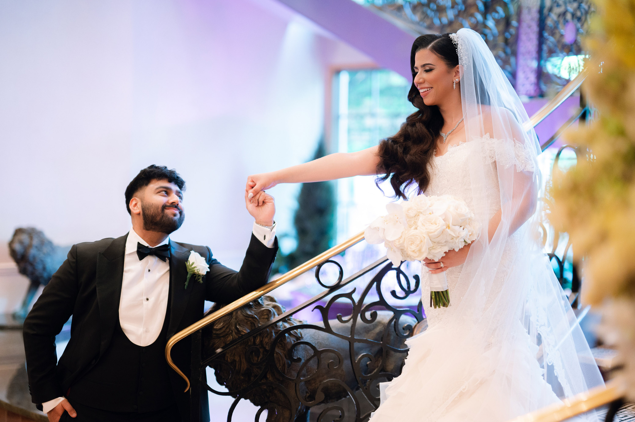 a bride and groom are posing for a picture