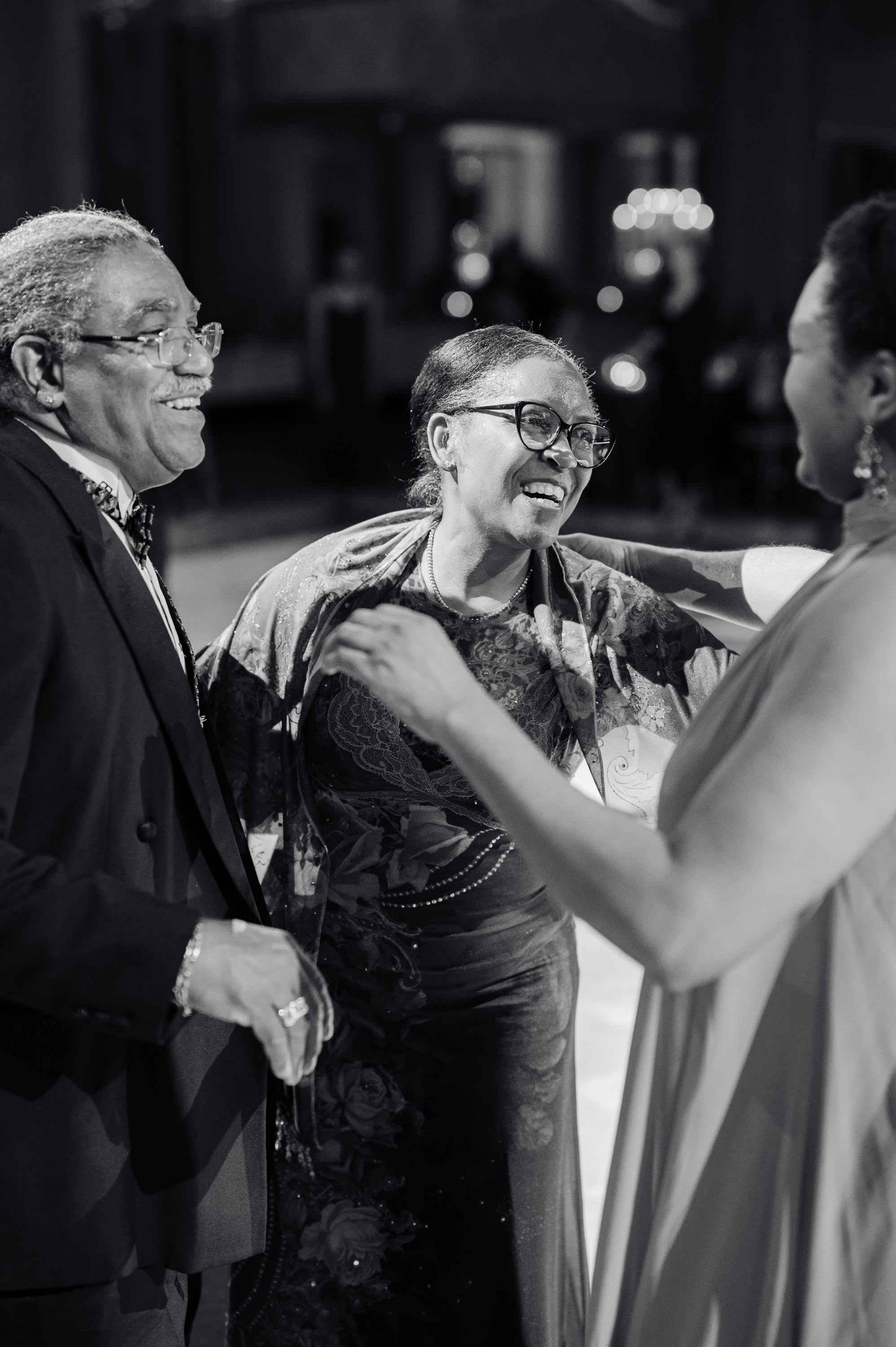 a man and woman are laughing together