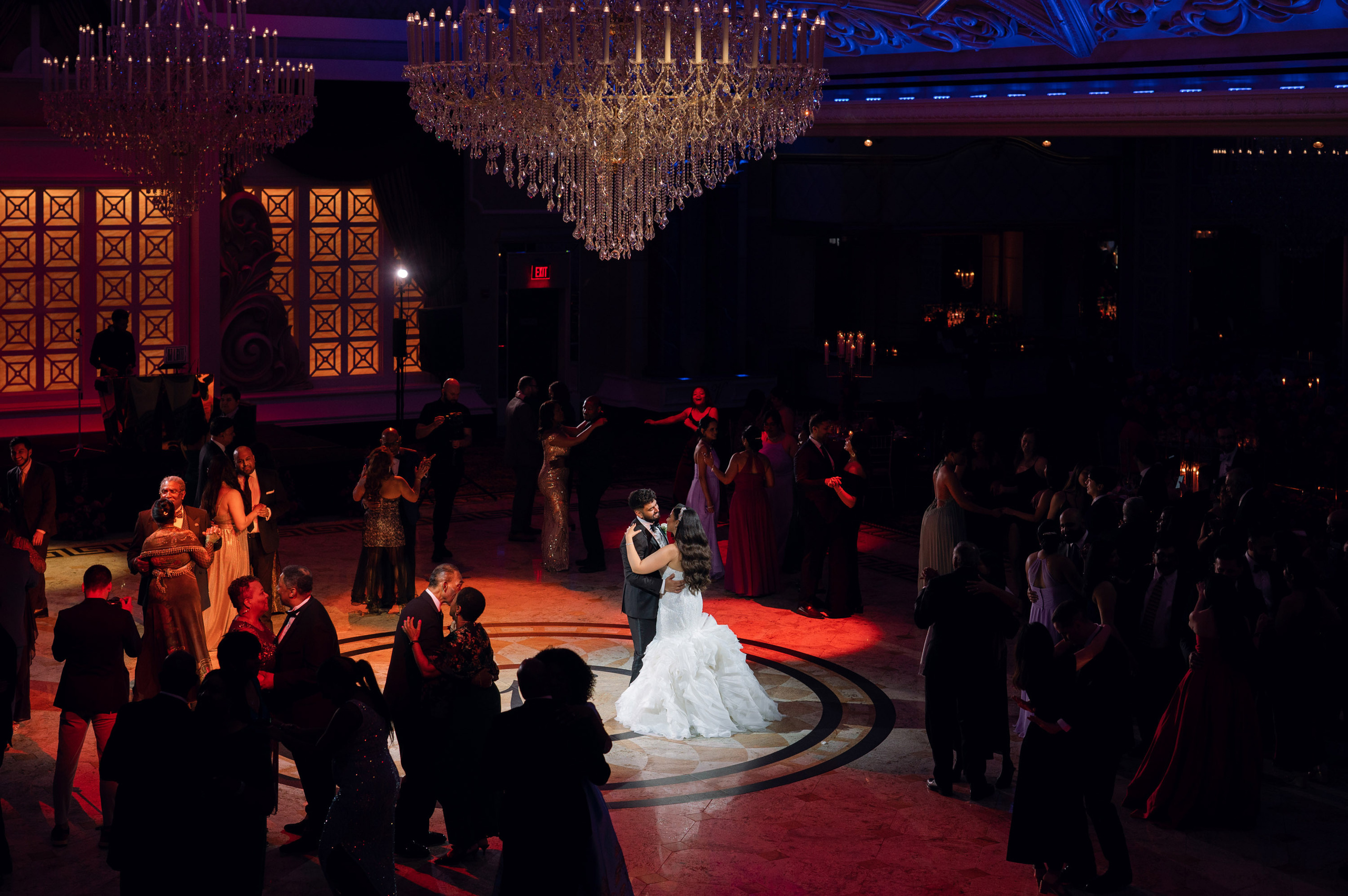 a couple dancing on a dance floor