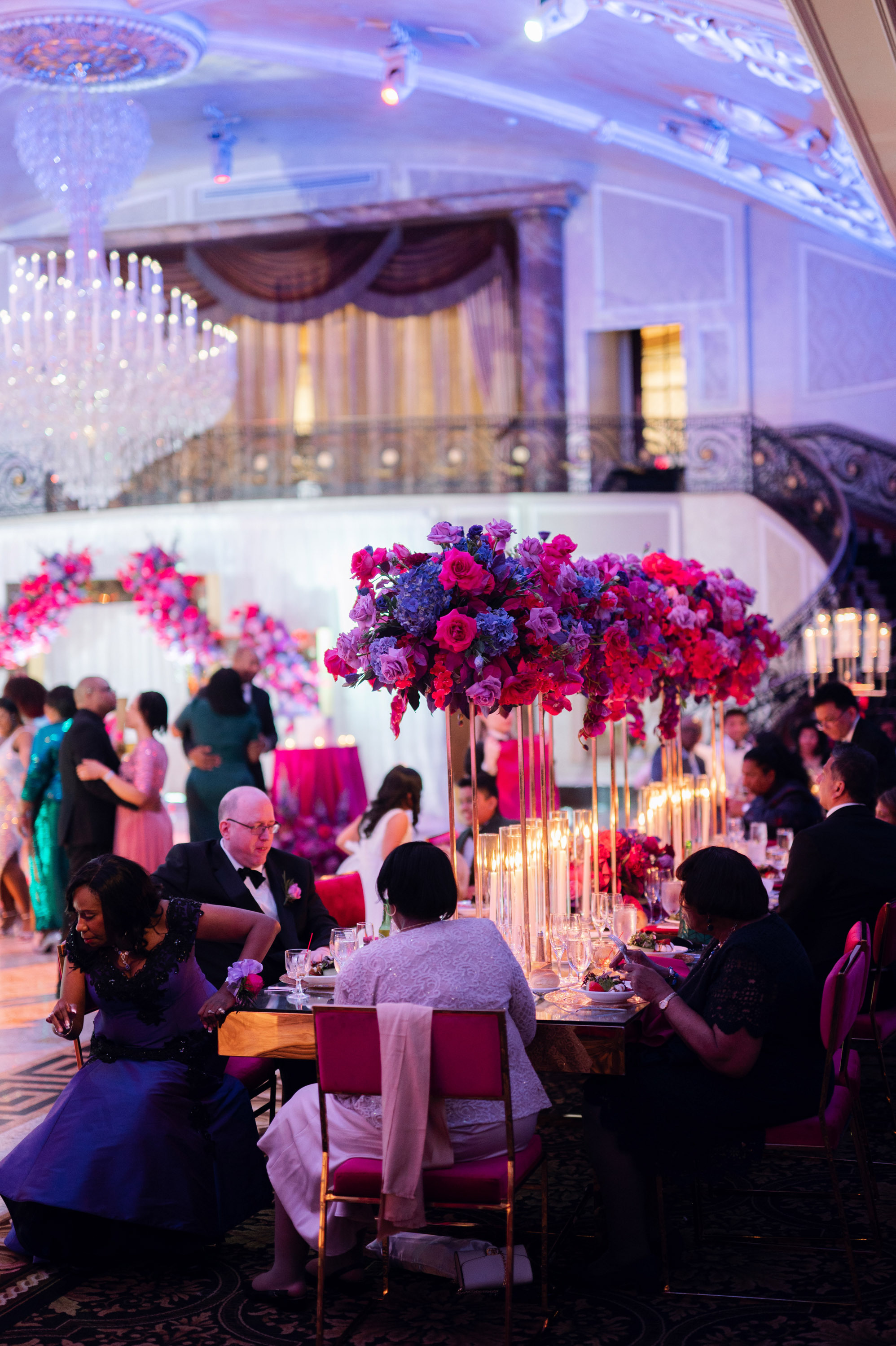 a group of people sitting around a table