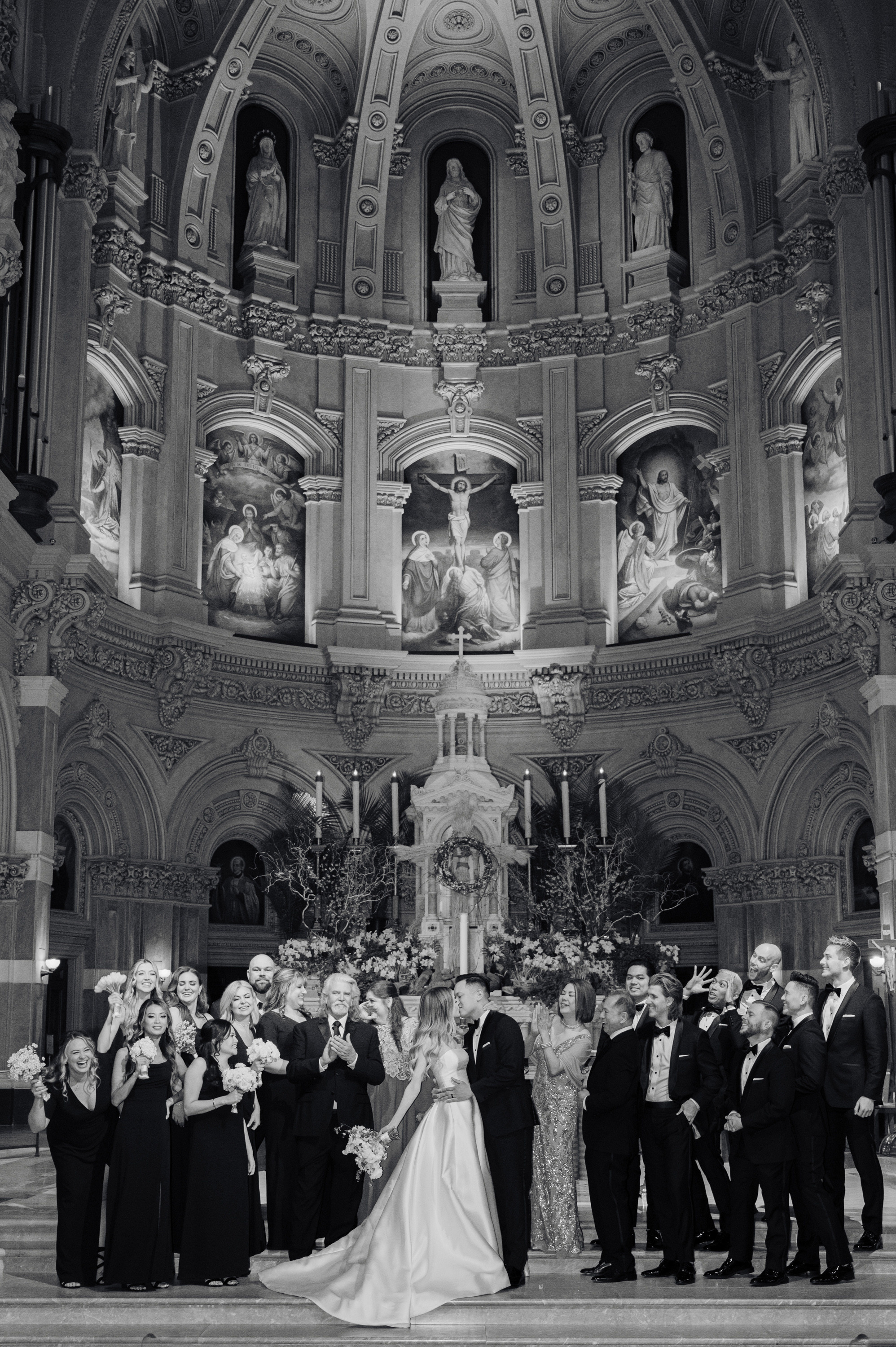 a group of people standing in front of a church