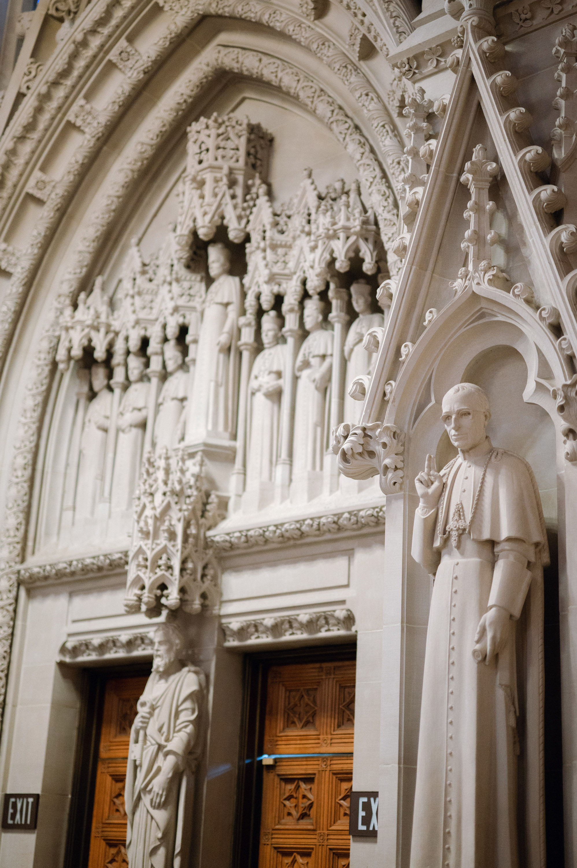 a statue of a man in front of a building